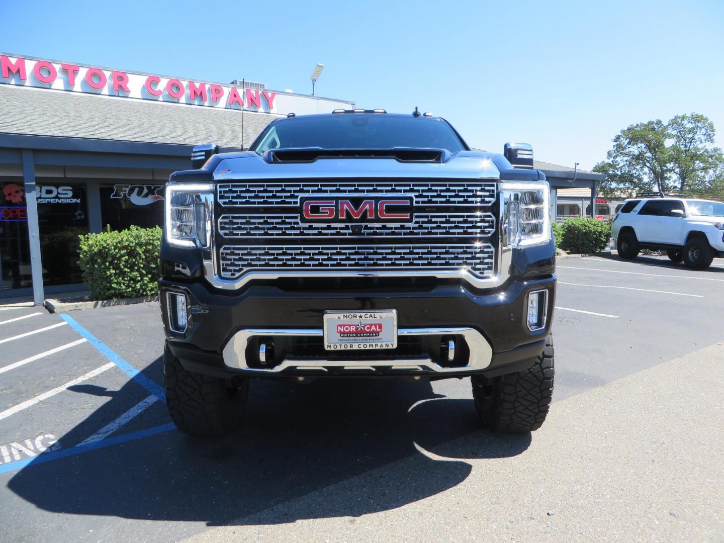 2023 /BLACK GMC Sierra 2500HD Denali Crew Cab 4WD SB (1GT49REY5PF) with an 6.6L V8 OHV 16V TURBO DIESEL engine, 6A transmission, located at 2630 Grass Valley Highway, Auburn, CA, 95603, (530) 508-5100, 38.937893, -121.095482 - Denali 2500 sitting on a BDS 5" suspension system, Upper control arms, Fox shocks, 20" 4 Play wheels, 37" Nitto Ridge Grappler tires, window tint, and weathertech floor liners. - Photo#2