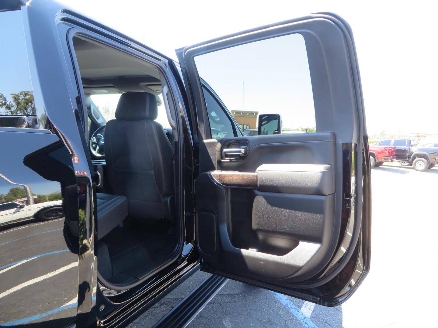 2023 /BLACK GMC Sierra 2500HD Denali Crew Cab 4WD SB (1GT49REY5PF) with an 6.6L V8 OHV 16V TURBO DIESEL engine, 6A transmission, located at 2630 Grass Valley Highway, Auburn, CA, 95603, (530) 508-5100, 38.937893, -121.095482 - Denali 2500 sitting on a BDS 5" suspension system, Upper control arms, Fox shocks, 20" 4 Play wheels, 37" Nitto Ridge Grappler tires, window tint, and weathertech floor liners. - Photo#52