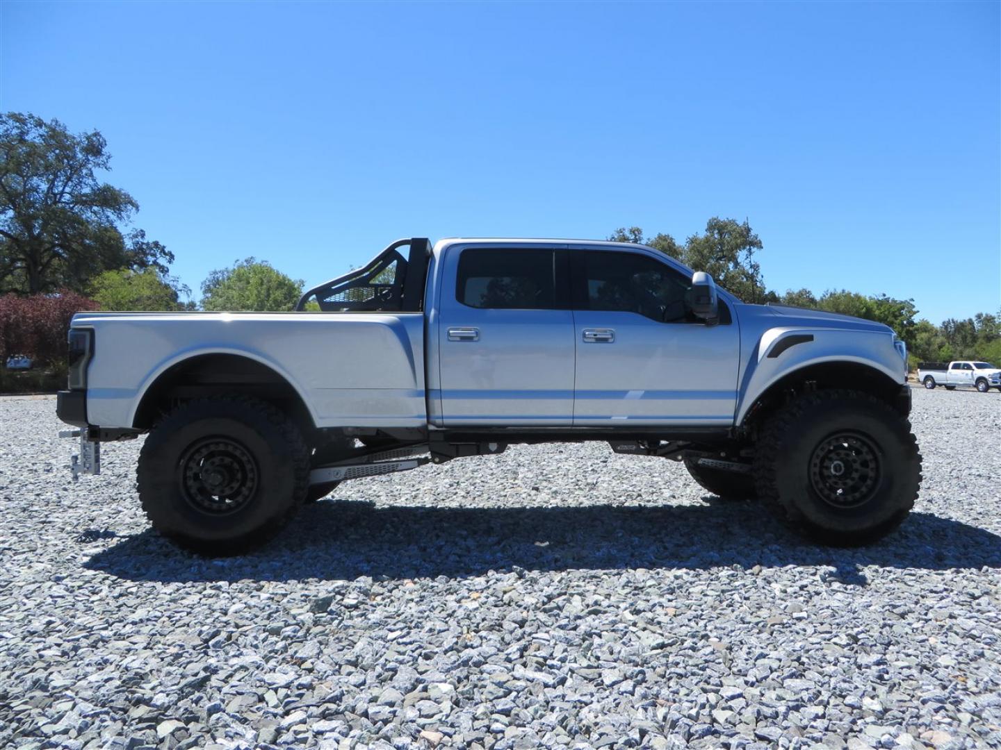 2022 Ford F-450 SD Limited Crew Cab DRW 4WD (1FT8W4DT3NE) with an 6.7L V8 OHV 16V DIESEL engine, 10 speed automatic transmission, located at 2630 Grass Valley Highway, Auburn, CA, 95603, (530) 508-5100, 38.937893, -121.095482 - 2022 Sintor Truck Ford F-450 Limited Iconic Silver This 2022 Sintor Trucks F-450 Lariat is fully equiped with a carbon package, pano roof, leather interior, large navigation screen and much more. This truck is ready for whatever the driver demands of it. With over a thousand man hours that goe - Photo#3