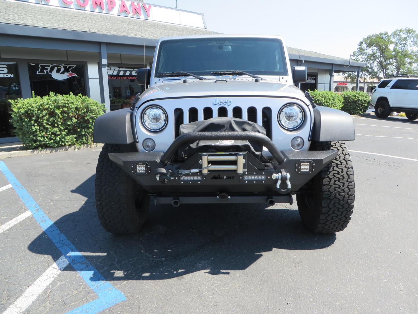 2018 /BLACK Jeep Wrangler Unlimited Rubicon 4WD (1C4HJWFG4JL) with an 3.6L V6 DOHC 24V FFV engine, automatic transmission, located at 2630 Grass Valley Highway, Auburn, CA, 95603, (530) 508-5100, 38.937893, -121.095482 - Rubicon features tow bar to be towed behind a motorhome, Mlight front bumper, led lights, Smittybilt XRC winch, Magnaflow exhaust, rocksliders, Method wheels, and BFG tires. - Photo#1