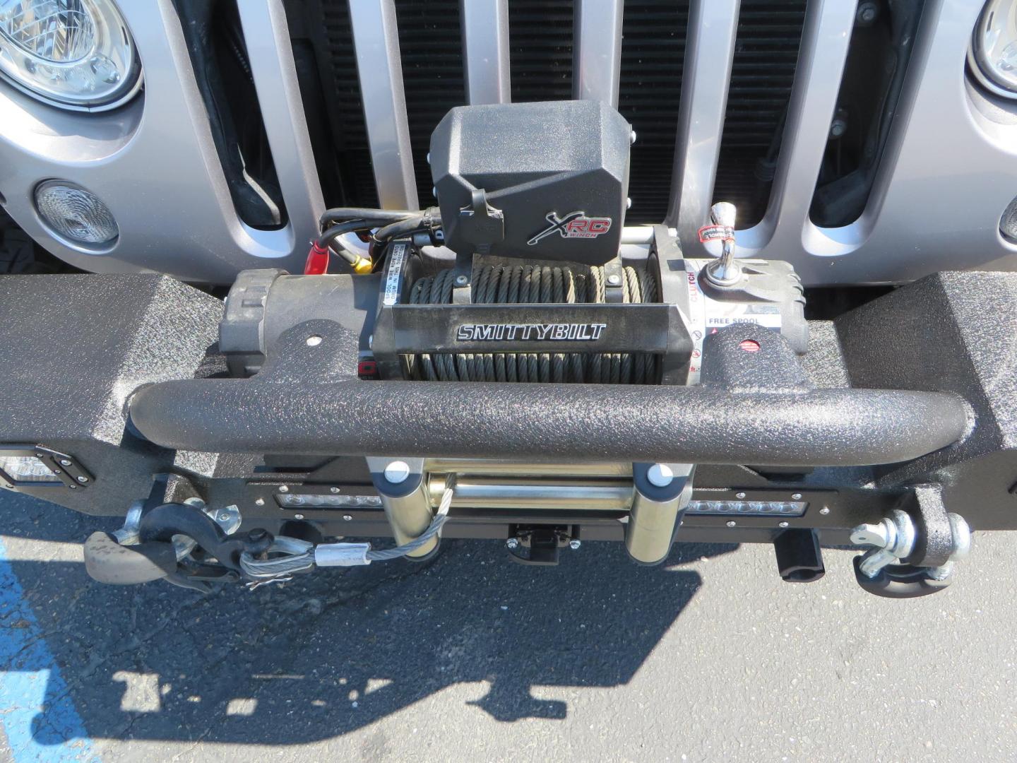 2018 /BLACK Jeep Wrangler Unlimited Rubicon 4WD (1C4HJWFG4JL) with an 3.6L V6 DOHC 24V FFV engine, automatic transmission, located at 2630 Grass Valley Highway, Auburn, CA, 95603, (530) 508-5100, 38.937893, -121.095482 - Rubicon features tow bar to be towed behind a motorhome, Mlight front bumper, led lights, Smittybilt XRC winch, Magnaflow exhaust, rocksliders, Method wheels, and BFG tires. - Photo#11