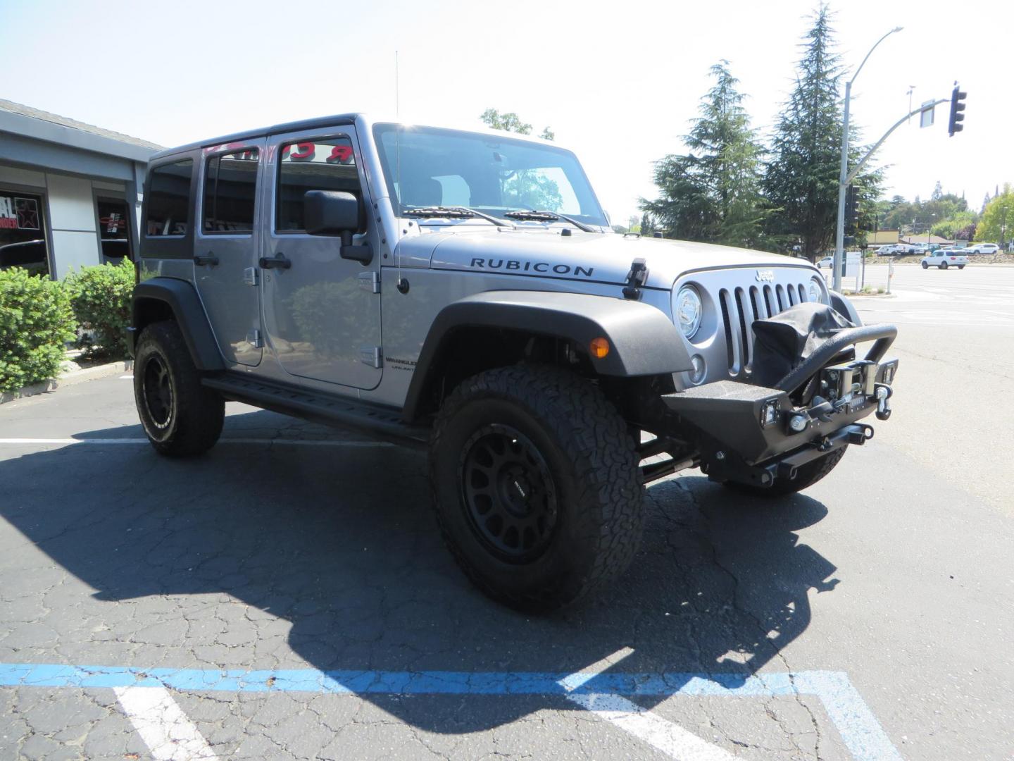 2018 /BLACK Jeep Wrangler Unlimited Rubicon 4WD (1C4HJWFG4JL) with an 3.6L V6 DOHC 24V FFV engine, automatic transmission, located at 2630 Grass Valley Highway, Auburn, CA, 95603, (530) 508-5100, 38.937893, -121.095482 - Rubicon features tow bar to be towed behind a motorhome, Mlight front bumper, led lights, Smittybilt XRC winch, Magnaflow exhaust, rocksliders, Method wheels, and BFG tires. - Photo#2