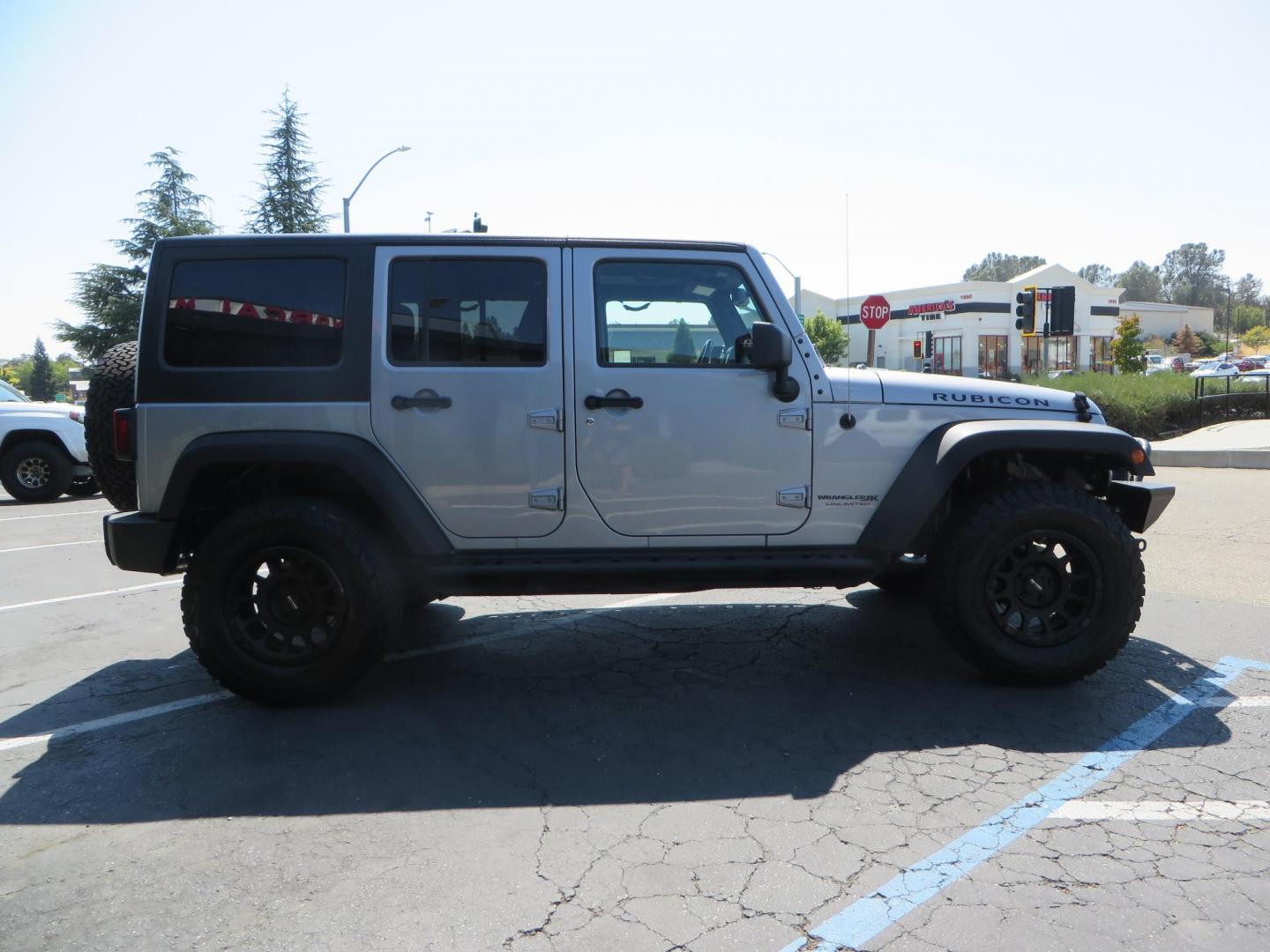 2018 /BLACK Jeep Wrangler Unlimited Rubicon 4WD (1C4HJWFG4JL) with an 3.6L V6 DOHC 24V FFV engine, automatic transmission, located at 2630 Grass Valley Highway, Auburn, CA, 95603, (530) 508-5100, 38.937893, -121.095482 - Rubicon features tow bar to be towed behind a motorhome, Mlight front bumper, led lights, Smittybilt XRC winch, Magnaflow exhaust, rocksliders, Method wheels, and BFG tires. - Photo#3