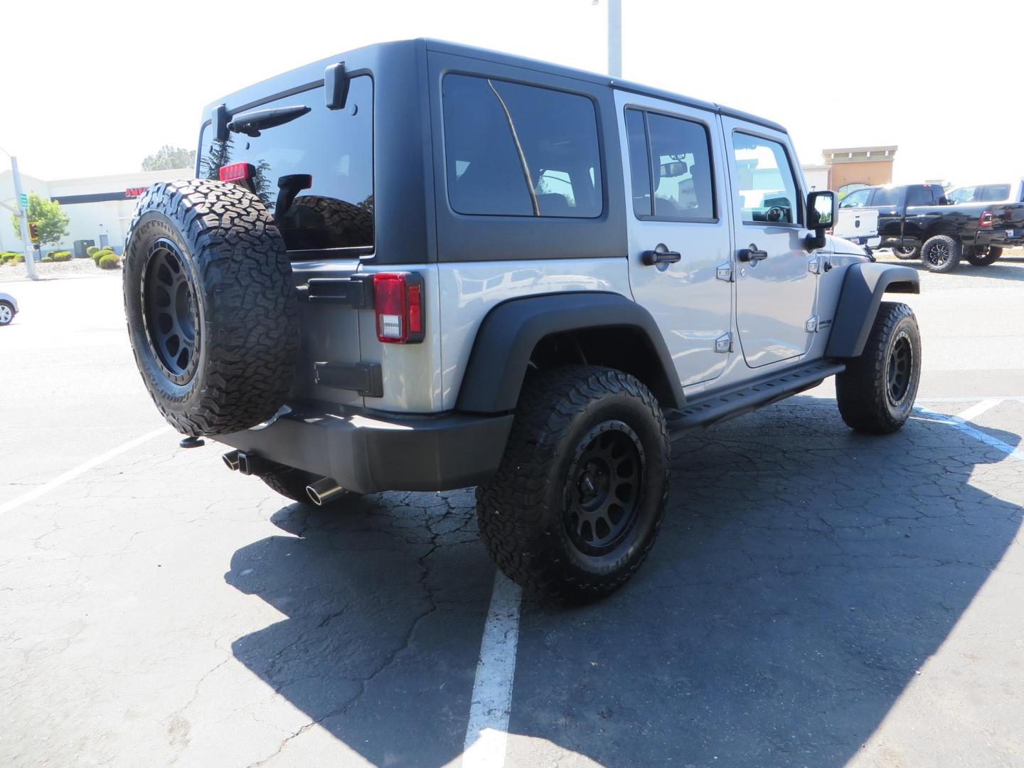 2018 /BLACK Jeep Wrangler Unlimited Rubicon 4WD (1C4HJWFG4JL) with an 3.6L V6 DOHC 24V FFV engine, automatic transmission, located at 2630 Grass Valley Highway, Auburn, CA, 95603, (530) 508-5100, 38.937893, -121.095482 - Rubicon features tow bar to be towed behind a motorhome, Mlight front bumper, led lights, Smittybilt XRC winch, Magnaflow exhaust, rocksliders, Method wheels, and BFG tires. - Photo#4