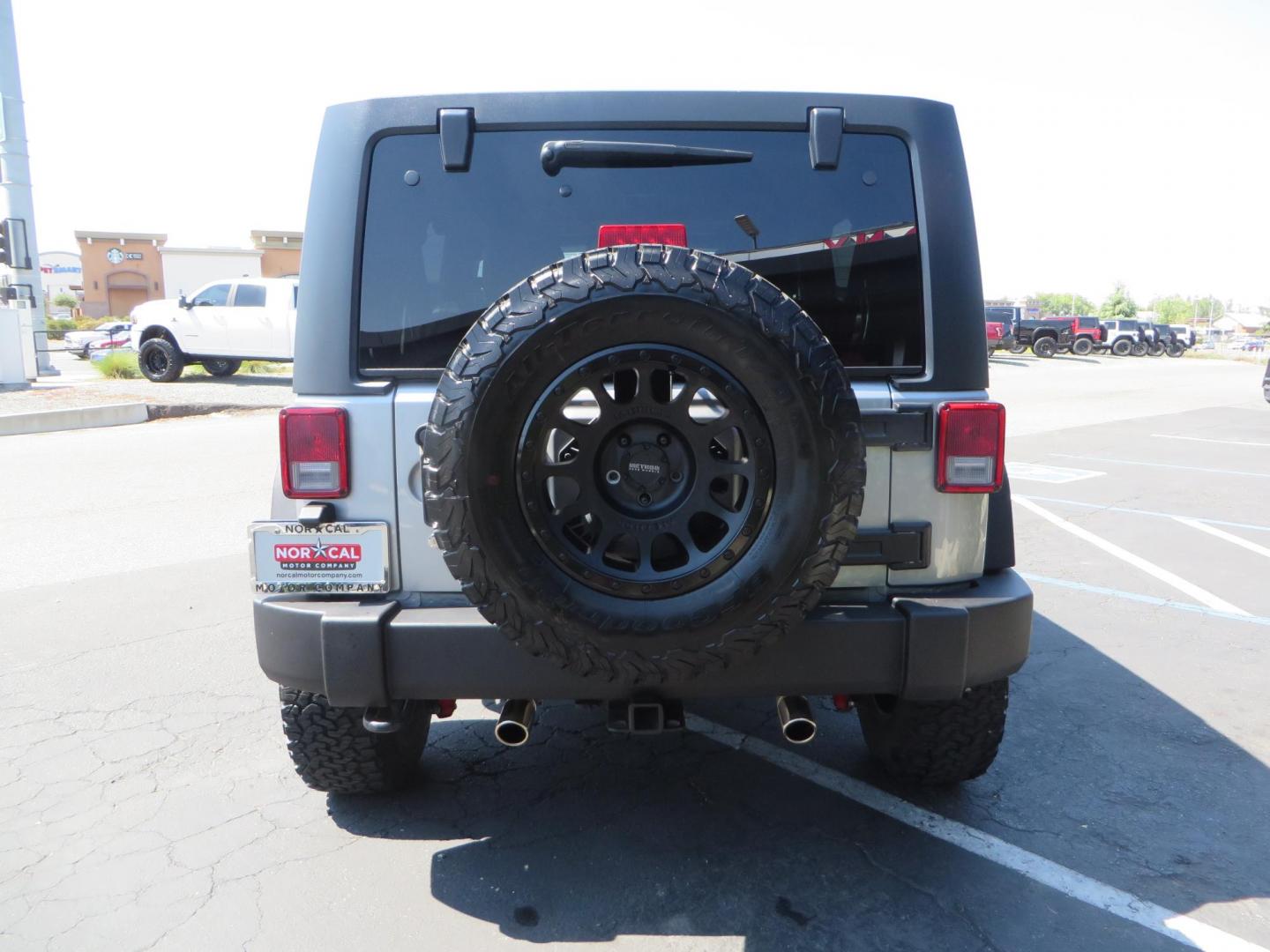 2018 /BLACK Jeep Wrangler Unlimited Rubicon 4WD (1C4HJWFG4JL) with an 3.6L V6 DOHC 24V FFV engine, automatic transmission, located at 2630 Grass Valley Highway, Auburn, CA, 95603, (530) 508-5100, 38.937893, -121.095482 - Rubicon features tow bar to be towed behind a motorhome, Mlight front bumper, led lights, Smittybilt XRC winch, Magnaflow exhaust, rocksliders, Method wheels, and BFG tires. - Photo#5