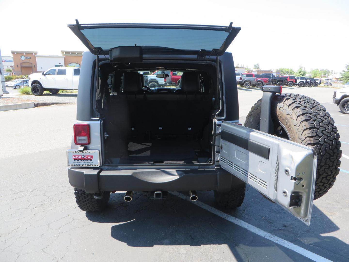 2018 /BLACK Jeep Wrangler Unlimited Rubicon 4WD (1C4HJWFG4JL) with an 3.6L V6 DOHC 24V FFV engine, automatic transmission, located at 2630 Grass Valley Highway, Auburn, CA, 95603, (530) 508-5100, 38.937893, -121.095482 - Rubicon features tow bar to be towed behind a motorhome, Mlight front bumper, led lights, Smittybilt XRC winch, Magnaflow exhaust, rocksliders, Method wheels, and BFG tires. - Photo#55