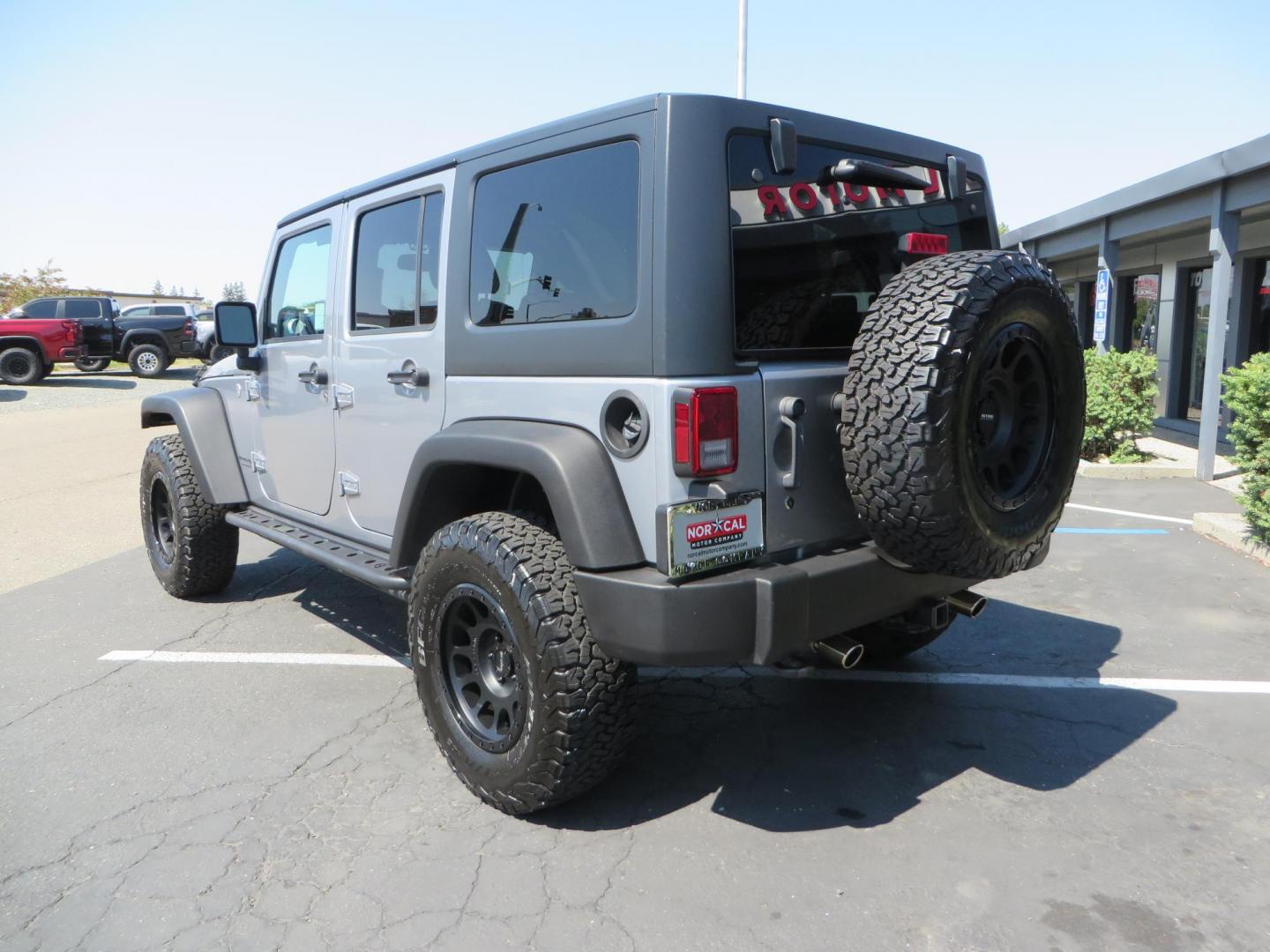 2018 /BLACK Jeep Wrangler Unlimited Rubicon 4WD (1C4HJWFG4JL) with an 3.6L V6 DOHC 24V FFV engine, automatic transmission, located at 2630 Grass Valley Highway, Auburn, CA, 95603, (530) 508-5100, 38.937893, -121.095482 - Rubicon features tow bar to be towed behind a motorhome, Mlight front bumper, led lights, Smittybilt XRC winch, Magnaflow exhaust, rocksliders, Method wheels, and BFG tires. - Photo#6