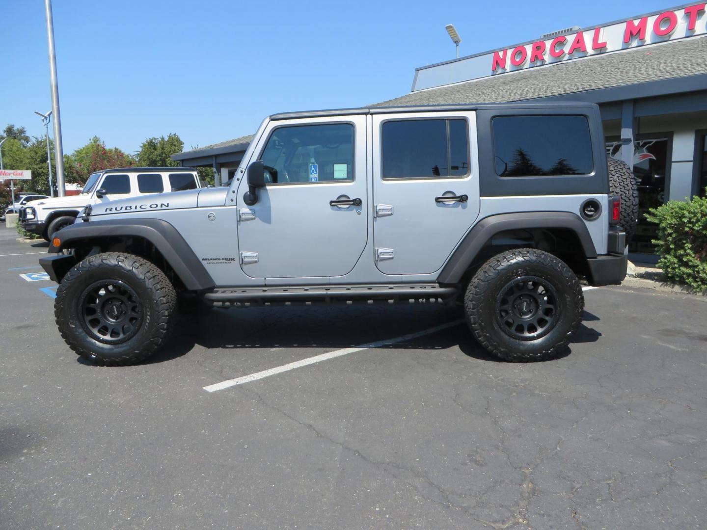 2018 /BLACK Jeep Wrangler Unlimited Rubicon 4WD (1C4HJWFG4JL) with an 3.6L V6 DOHC 24V FFV engine, automatic transmission, located at 2630 Grass Valley Highway, Auburn, CA, 95603, (530) 508-5100, 38.937893, -121.095482 - Rubicon features tow bar to be towed behind a motorhome, Mlight front bumper, led lights, Smittybilt XRC winch, Magnaflow exhaust, rocksliders, Method wheels, and BFG tires. - Photo#7