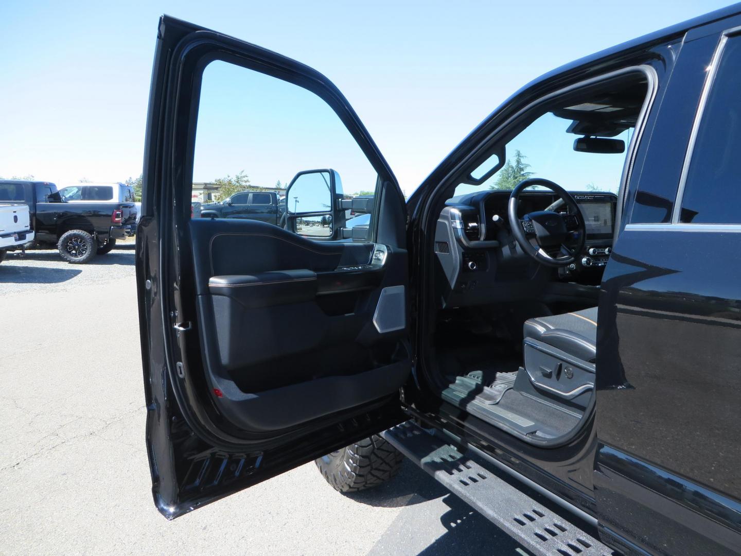 2023 /BLACK Ford F-350 SD Platinum Crew Cab Short Bed 4WD (1FT8W3BM5PE) with an 6.7L V8 OHV 16V DIESEL engine, 6A transmission, located at 2630 Grass Valley Highway, Auburn, CA, 95603, (530) 508-5100, 38.937893, -121.095482 - Features a BDS 3" radius arm suspension system, Fox 2.0 Shocks, 20" Method 323 wheels, 37" Nito Ridge Grappler tires, and a factory slim line bug deflector. - Photo#26