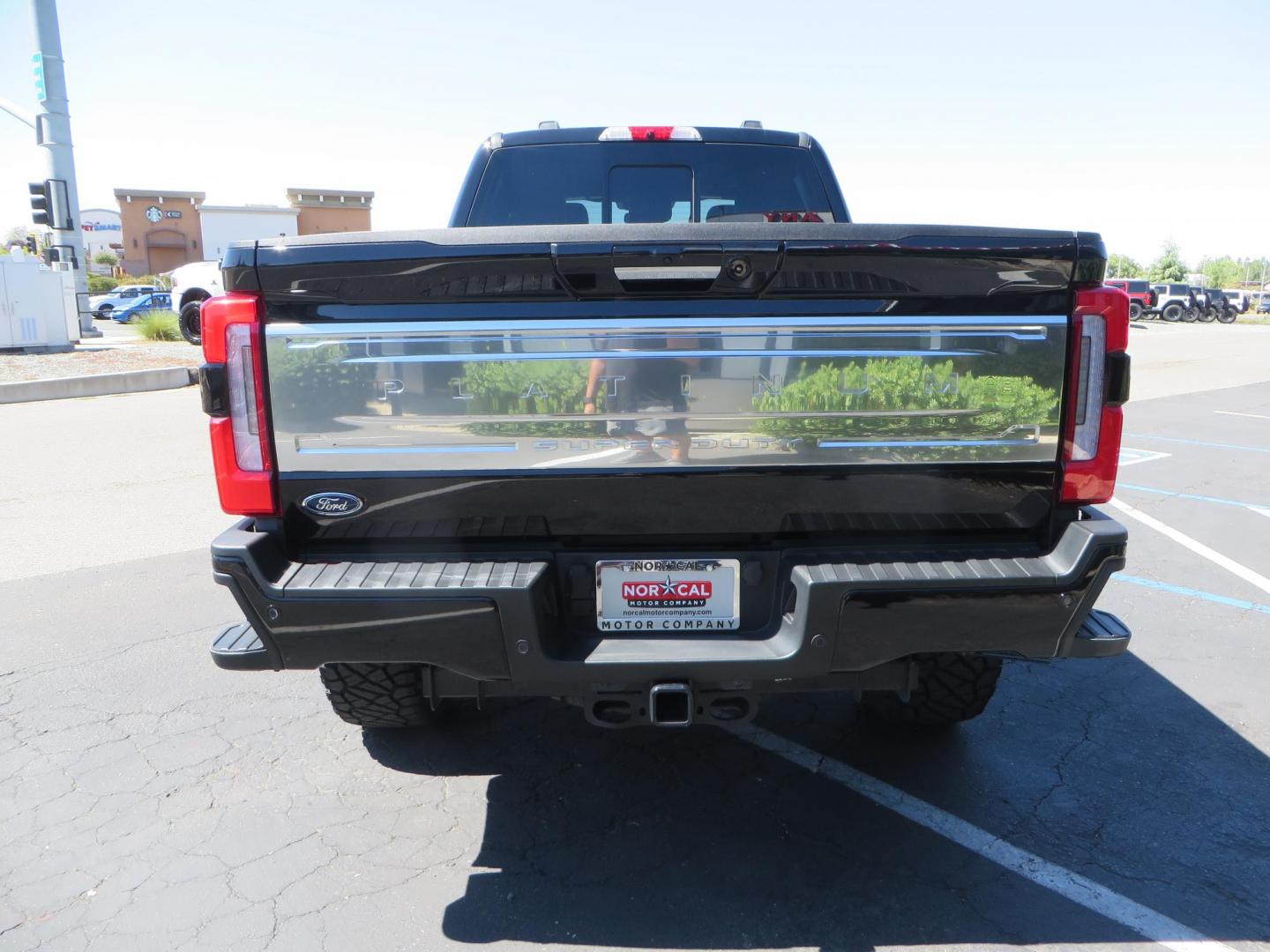 2023 /BLACK Ford F-350 SD Platinum Crew Cab Short Bed 4WD (1FT8W3BM5PE) with an 6.7L V8 OHV 16V DIESEL engine, 6A transmission, located at 2630 Grass Valley Highway, Auburn, CA, 95603, (530) 508-5100, 38.937893, -121.095482 - Features a BDS 3" radius arm suspension system, Fox 2.0 Shocks, 20" Method 323 wheels, 37" Nito Ridge Grappler tires, and a factory slim line bug deflector. - Photo#5