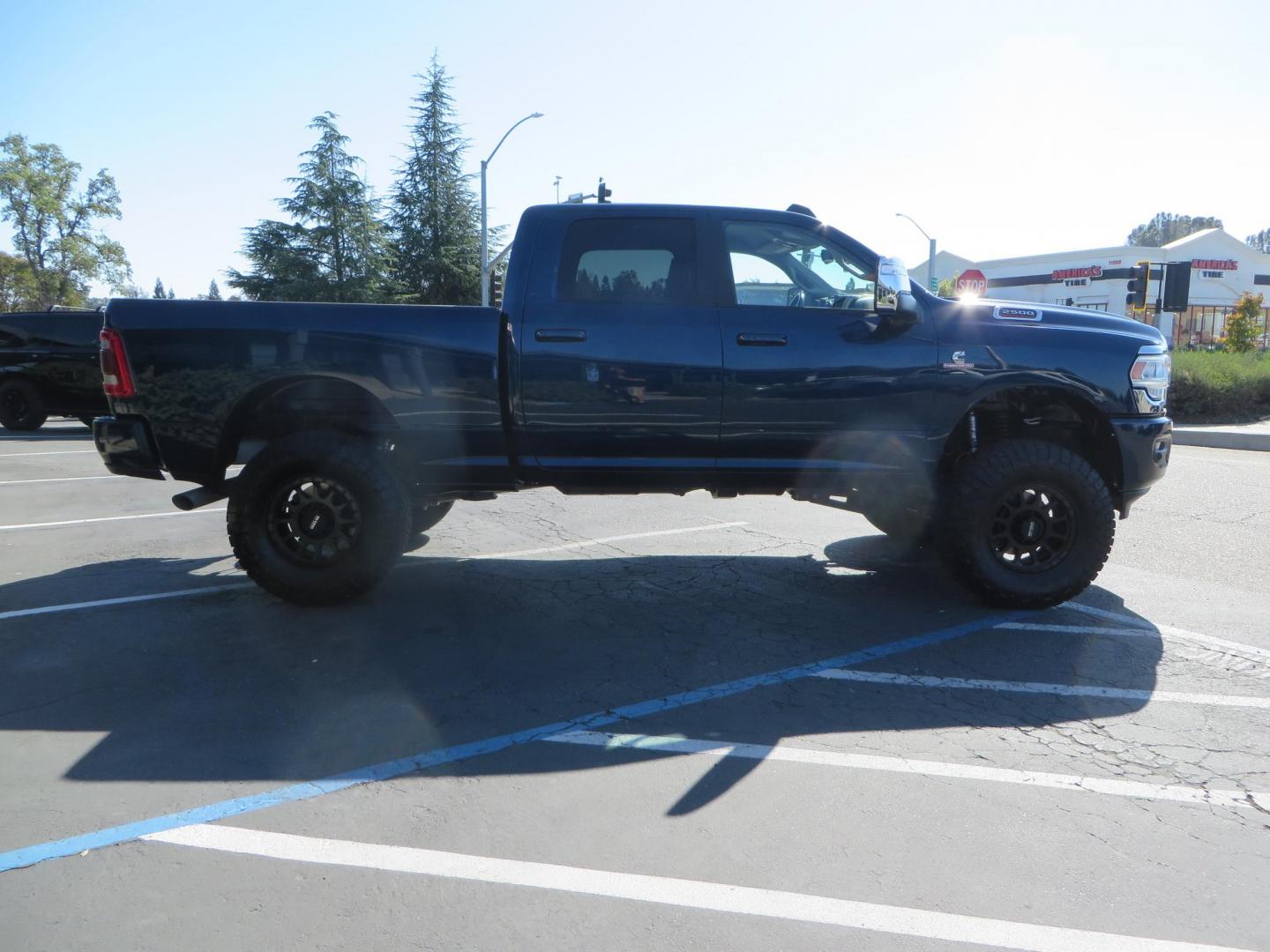 2023 Blue /black RAM 2500 Laramie Crew Cab SWB 4WD (3C6UR5FL9PG) with an 6.7L L6 OHV 24V TURBO DIESEL engine, 6A transmission, located at 2630 Grass Valley Highway, Auburn, CA, 95603, (530) 508-5100, 38.937893, -121.095482 - Laramie sitting on a Zone Offroad 4" suspension system, Fox shocks, 37" Nitto Ridge Grappler tires, and 18" Method Race Wheels. - Photo#3