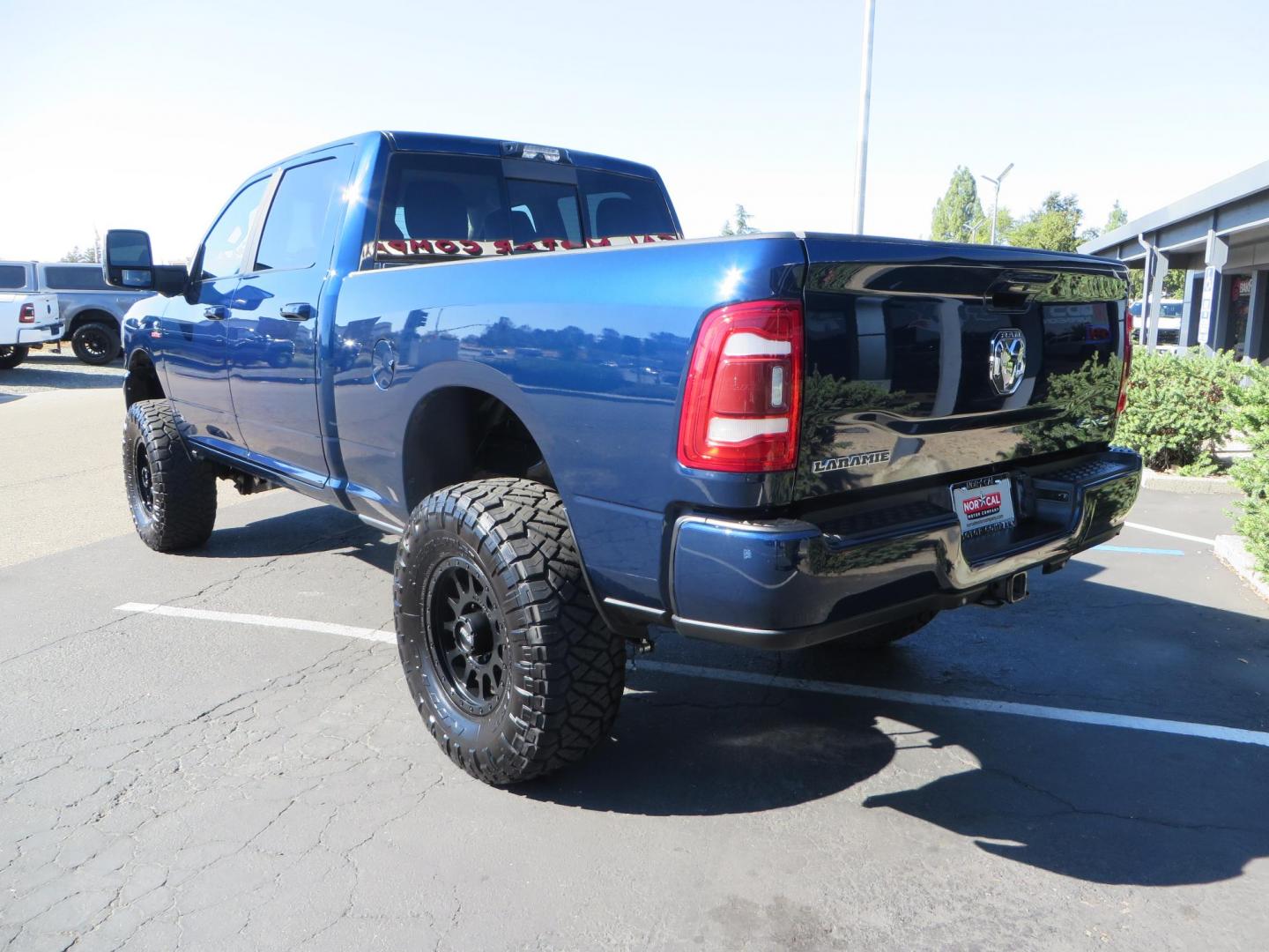 2023 Blue /black RAM 2500 Laramie Crew Cab SWB 4WD (3C6UR5FL9PG) with an 6.7L L6 OHV 24V TURBO DIESEL engine, 6A transmission, located at 2630 Grass Valley Highway, Auburn, CA, 95603, (530) 508-5100, 38.937893, -121.095482 - Laramie sitting on a Zone Offroad 4" suspension system, Fox shocks, 37" Nitto Ridge Grappler tires, and 18" Method Race Wheels. - Photo#4