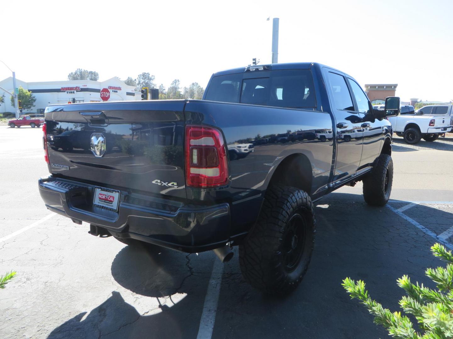 2023 Blue /black RAM 2500 Laramie Crew Cab SWB 4WD (3C6UR5FL9PG) with an 6.7L L6 OHV 24V TURBO DIESEL engine, 6A transmission, located at 2630 Grass Valley Highway, Auburn, CA, 95603, (530) 508-5100, 38.937893, -121.095482 - Laramie sitting on a Zone Offroad 4" suspension system, Fox shocks, 37" Nitto Ridge Grappler tires, and 18" Method Race Wheels. - Photo#5