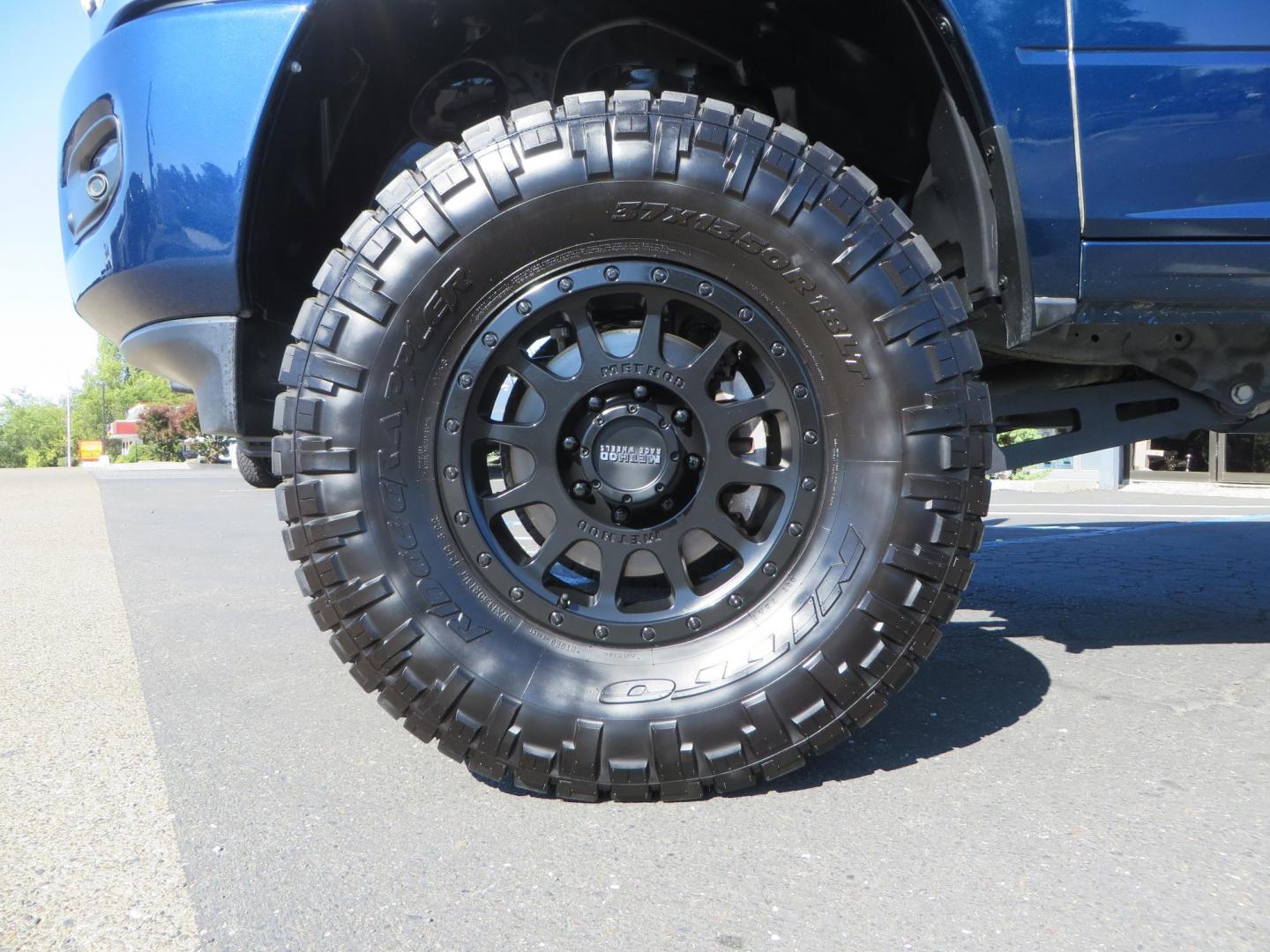 2023 Blue /black RAM 2500 Laramie Crew Cab SWB 4WD (3C6UR5FL9PG) with an 6.7L L6 OHV 24V TURBO DIESEL engine, 6A transmission, located at 2630 Grass Valley Highway, Auburn, CA, 95603, (530) 508-5100, 38.937893, -121.095482 - Laramie sitting on a Zone Offroad 4" suspension system, Fox shocks, 37" Nitto Ridge Grappler tires, and 18" Method Race Wheels. - Photo#9