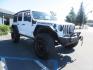 2021 White /BLACK Jeep Wrangler Unlimited Rubicon (1C4HJXFN7MW) with an 2.0L L4 DOHC 16V TURBO engine, 6A transmission, located at 2630 Grass Valley Highway, Auburn, CA, 95603, (530) 508-5100, 38.937893, -121.095482 - Features a Zone Offroad 3" lift kit, Fox Adventure series shocks, 17" Method MR315 wheels, 37" Toyo AT3 tires, Smittybilt XRC front and rear bumpers, Smittybilt Synthetic rope winch, RC inner fender liners, and Barricade front and rear flat fenders. - Photo#1