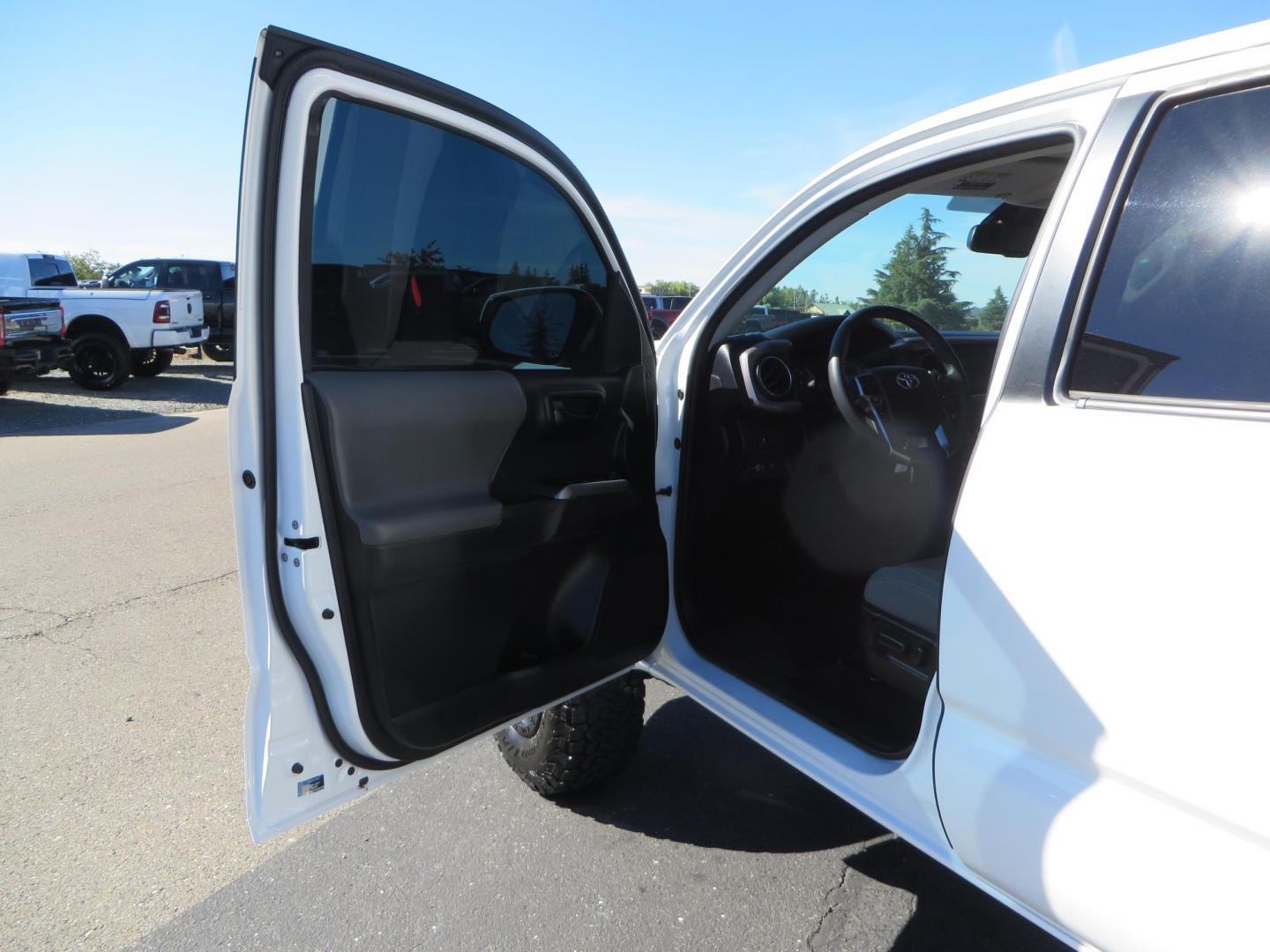 2021 White Toyota Tacoma SR5 Double Cab V6 6AT 4WD (3TMCZ5AN3MM) with an 3.5L V6 DOHC 24V engine, 6A transmission, located at 2630 Grass Valley Highway, Auburn, CA, 95603, (530) 508-5100, 38.937893, -121.095482 - Tacoma SR5 sitting on Bilstein 5100 series front struts and rear shocks, BFG KO2 tires, Method NV wheels, and window tint. - Photo#15