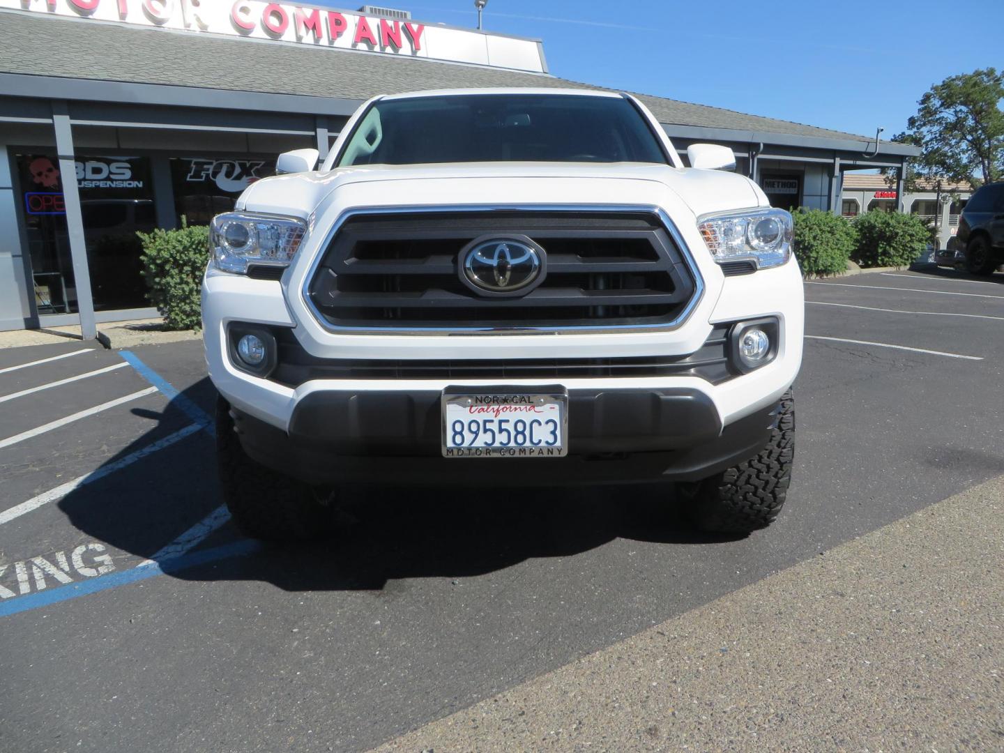 2021 White Toyota Tacoma SR5 Double Cab V6 6AT 4WD (3TMCZ5AN3MM) with an 3.5L V6 DOHC 24V engine, 6A transmission, located at 2630 Grass Valley Highway, Auburn, CA, 95603, (530) 508-5100, 38.937893, -121.095482 - Tacoma SR5 sitting on Bilstein 5100 series front struts and rear shocks, BFG KO2 tires, Method NV wheels, and window tint. - Photo#1