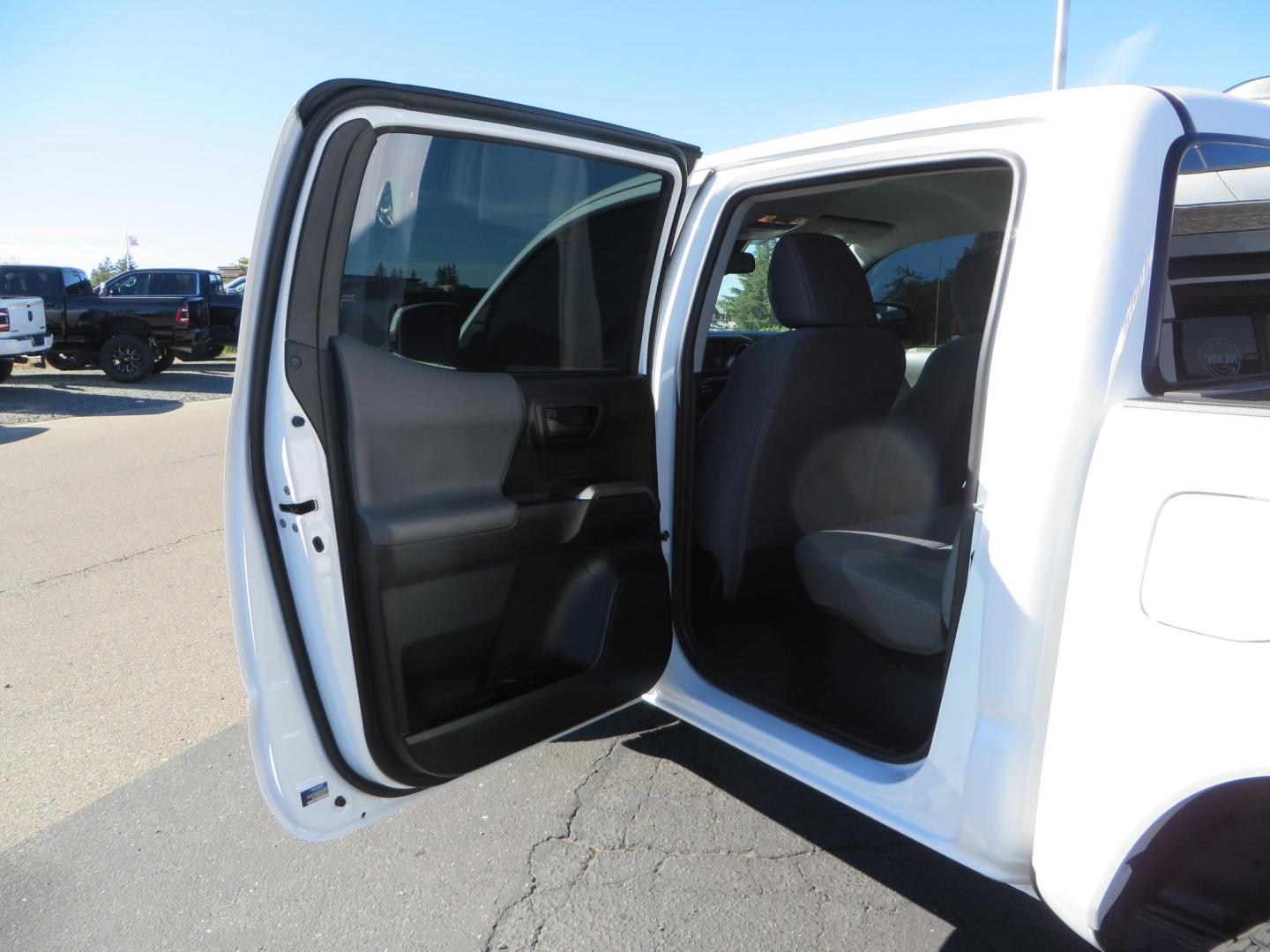 2021 White Toyota Tacoma SR5 Double Cab V6 6AT 4WD (3TMCZ5AN3MM) with an 3.5L V6 DOHC 24V engine, 6A transmission, located at 2630 Grass Valley Highway, Auburn, CA, 95603, (530) 508-5100, 38.937893, -121.095482 - Tacoma SR5 sitting on Bilstein 5100 series front struts and rear shocks, BFG KO2 tires, Method NV wheels, and window tint. - Photo#32