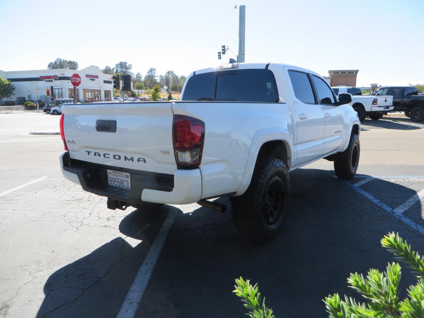 2021 White Toyota Tacoma SR5 Double Cab V6 6AT 4WD (3TMCZ5AN3MM) with an 3.5L V6 DOHC 24V engine, 6A transmission, located at 2630 Grass Valley Highway, Auburn, CA, 95603, (530) 508-5100, 38.937893, -121.095482 - Tacoma SR5 sitting on Bilstein 5100 series front struts and rear shocks, BFG KO2 tires, Method NV wheels, and window tint. - Photo#3