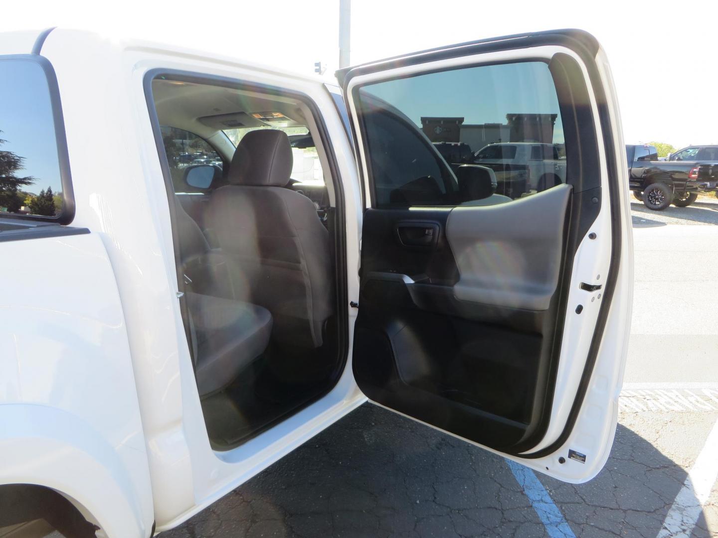 2021 White Toyota Tacoma SR5 Double Cab V6 6AT 4WD (3TMCZ5AN3MM) with an 3.5L V6 DOHC 24V engine, 6A transmission, located at 2630 Grass Valley Highway, Auburn, CA, 95603, (530) 508-5100, 38.937893, -121.095482 - Tacoma SR5 sitting on Bilstein 5100 series front struts and rear shocks, BFG KO2 tires, Method NV wheels, and window tint. - Photo#45