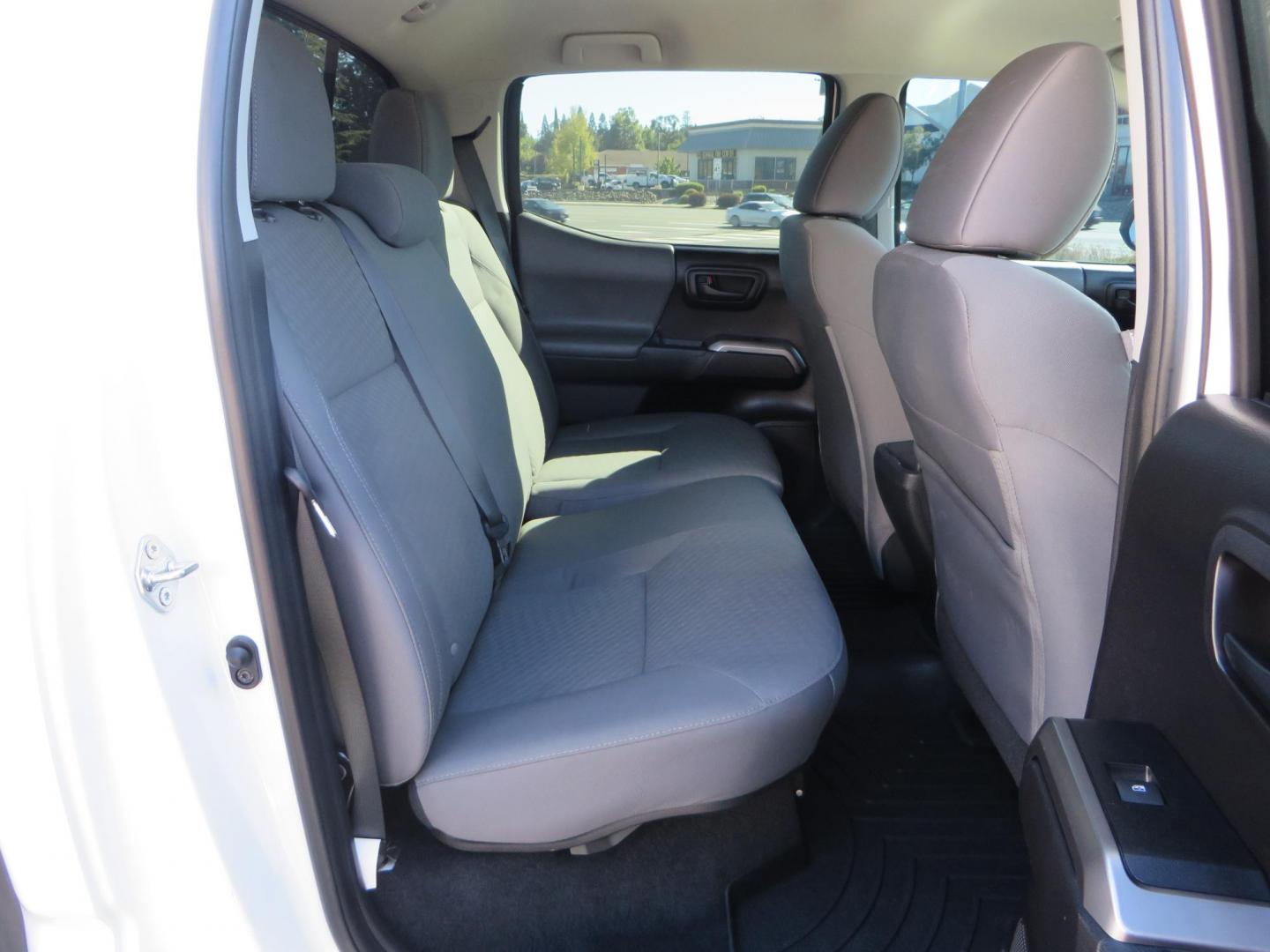 2021 White Toyota Tacoma SR5 Double Cab V6 6AT 4WD (3TMCZ5AN3MM) with an 3.5L V6 DOHC 24V engine, 6A transmission, located at 2630 Grass Valley Highway, Auburn, CA, 95603, (530) 508-5100, 38.937893, -121.095482 - Tacoma SR5 sitting on Bilstein 5100 series front struts and rear shocks, BFG KO2 tires, Method NV wheels, and window tint. - Photo#51