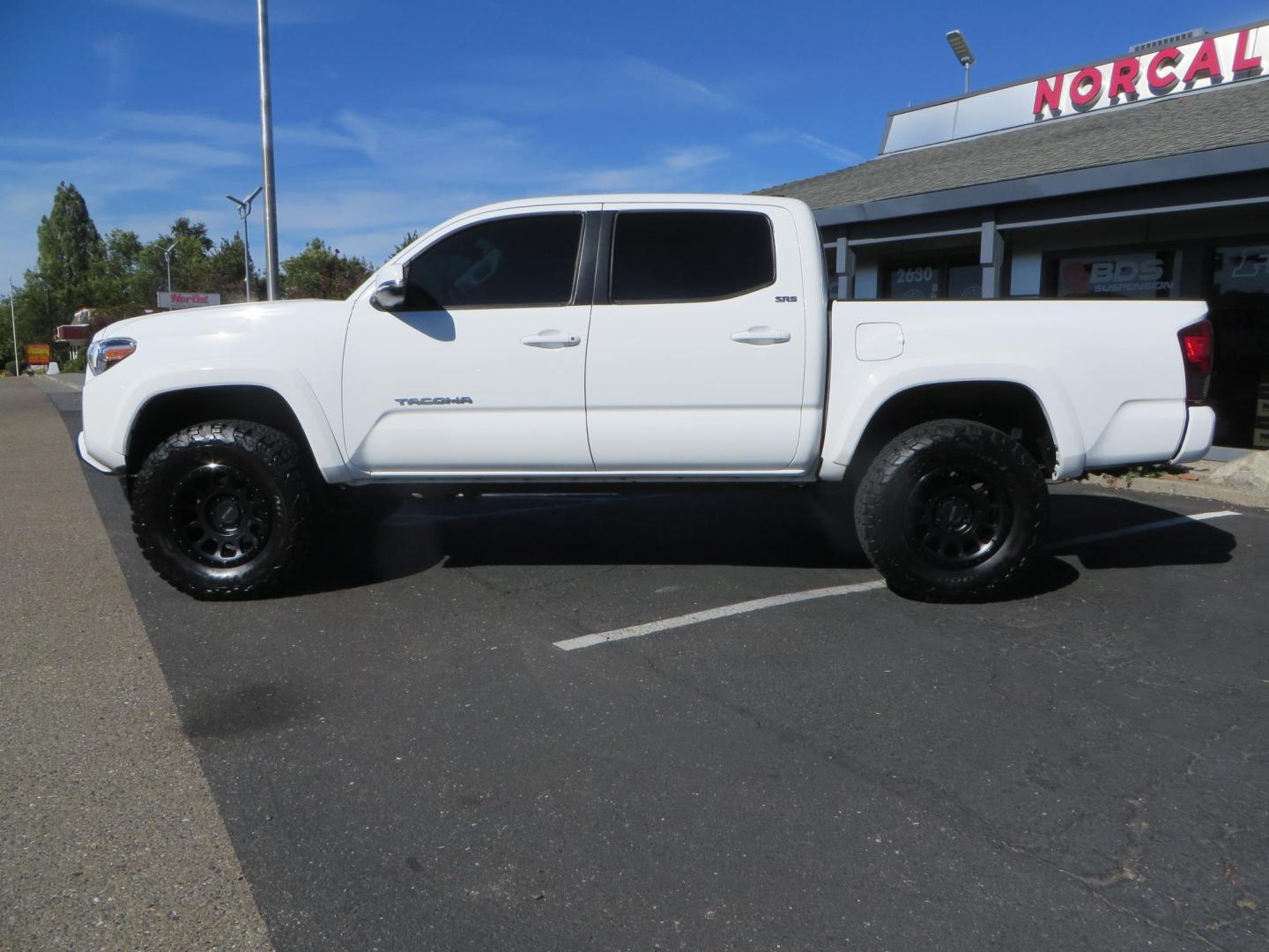 2021 White Toyota Tacoma SR5 Double Cab V6 6AT 4WD (3TMCZ5AN3MM) with an 3.5L V6 DOHC 24V engine, 6A transmission, located at 2630 Grass Valley Highway, Auburn, CA, 95603, (530) 508-5100, 38.937893, -121.095482 - Tacoma SR5 sitting on Bilstein 5100 series front struts and rear shocks, BFG KO2 tires, Method NV wheels, and window tint. - Photo#7