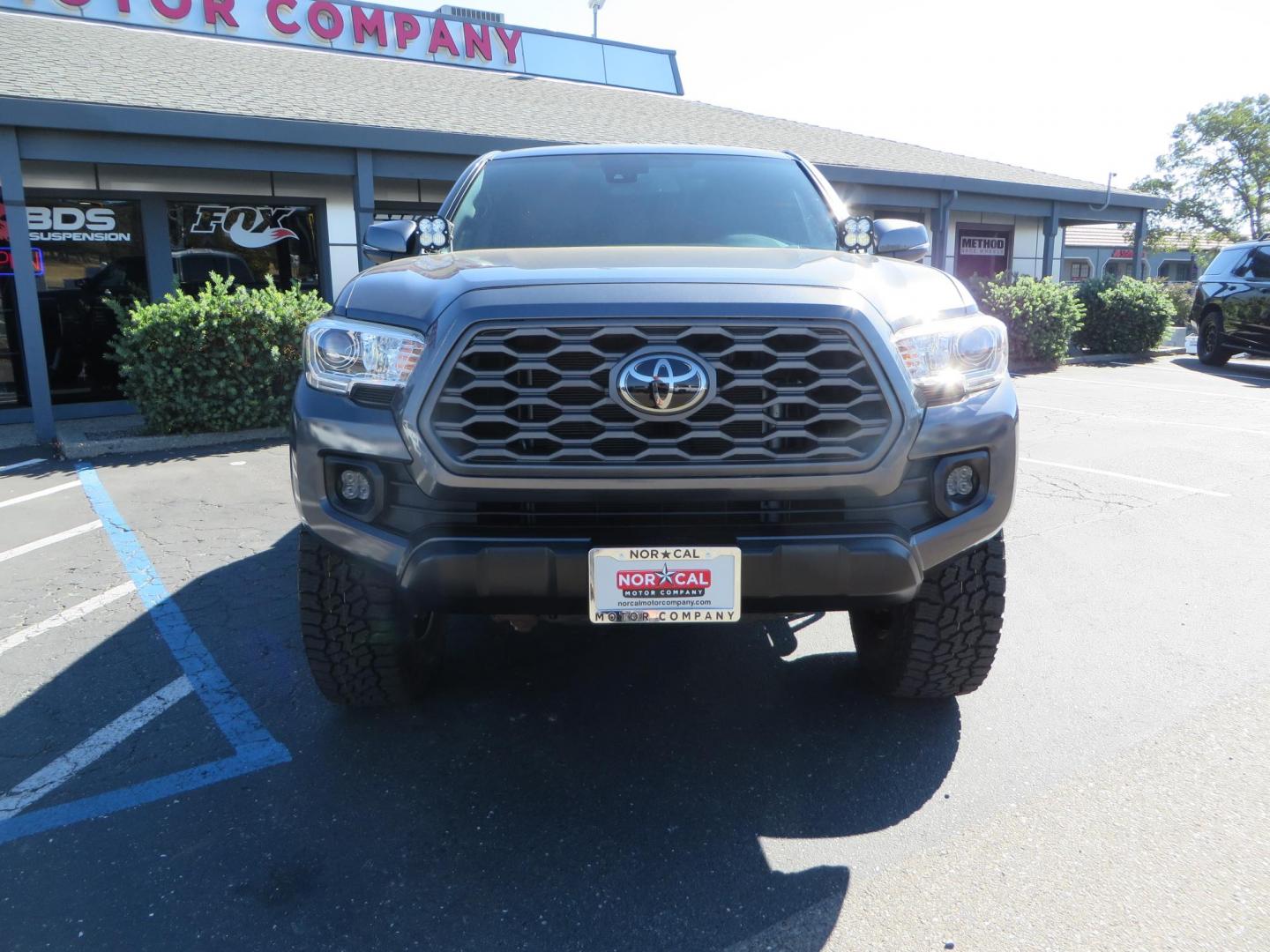 2020 Charcoal /GREY Toyota Tacoma SR5 Double Cab Long Bed V6 6AT 4WD (3TMDZ5BN2LM) with an 3.5L V6 DOHC 24V engine, 6A transmission, located at 2630 Grass Valley Highway, Auburn, CA, 95603, (530) 508-5100, 38.937893, -121.095482 - Tacoma featuring Bilstein 5100 series struts and rear shocks, Icon read add a packs, Method Wheels, Falken Wildpeak AT tires, N-fab runnign boards, Bakflip MX4 bedcover, Molle bed panels, Led Fog lights, and Baja Designs A pillar lights. - Photo#1