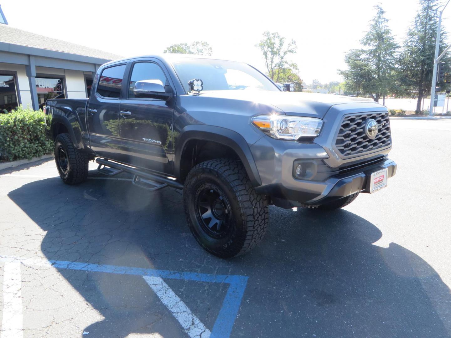 2020 Charcoal /GREY Toyota Tacoma SR5 Double Cab Long Bed V6 6AT 4WD (3TMDZ5BN2LM) with an 3.5L V6 DOHC 24V engine, 6A transmission, located at 2630 Grass Valley Highway, Auburn, CA, 95603, (530) 508-5100, 38.937893, -121.095482 - Tacoma featuring Bilstein 5100 series struts and rear shocks, Icon read add a packs, Method Wheels, Falken Wildpeak AT tires, N-fab runnign boards, Bakflip MX4 bedcover, Molle bed panels, Led Fog lights, and Baja Designs A pillar lights. - Photo#2