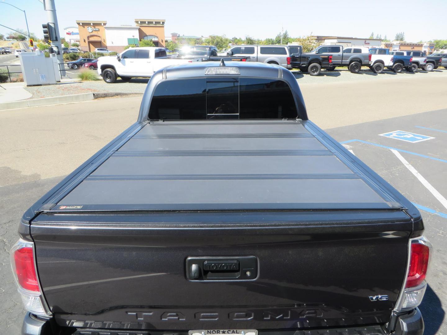 2020 Charcoal /GREY Toyota Tacoma SR5 Double Cab Long Bed V6 6AT 4WD (3TMDZ5BN2LM) with an 3.5L V6 DOHC 24V engine, 6A transmission, located at 2630 Grass Valley Highway, Auburn, CA, 95603, (530) 508-5100, 38.937893, -121.095482 - Tacoma featuring Bilstein 5100 series struts and rear shocks, Icon read add a packs, Method Wheels, Falken Wildpeak AT tires, N-fab runnign boards, Bakflip MX4 bedcover, Molle bed panels, Led Fog lights, and Baja Designs A pillar lights. - Photo#11