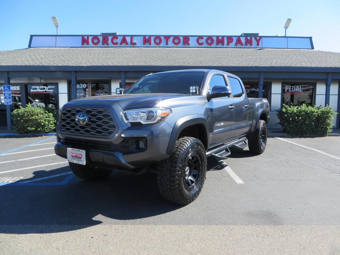 2020 Charcoal /GREY Toyota Tacoma SR5 Double Cab Long Bed V6 6AT 4WD (3TMDZ5BN2LM) with an 3.5L V6 DOHC 24V engine, 6A transmission, located at 2630 Grass Valley Highway, Auburn, CA, 95603, (530) 508-5100, 38.937893, -121.095482 - Tacoma featuring Bilstein 5100 series struts and rear shocks, Icon read add a packs, Method Wheels, Falken Wildpeak AT tires, N-fab runnign boards, Bakflip MX4 bedcover, Molle bed panels, Led Fog lights, and Baja Designs A pillar lights. - Photo#0