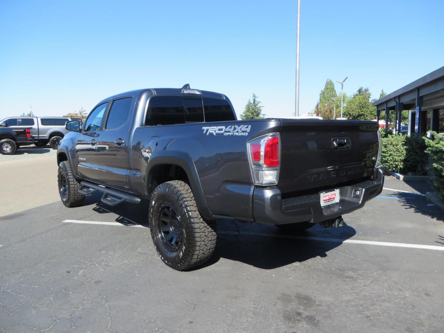 2020 Charcoal /GREY Toyota Tacoma SR5 Double Cab Long Bed V6 6AT 4WD (3TMDZ5BN2LM) with an 3.5L V6 DOHC 24V engine, 6A transmission, located at 2630 Grass Valley Highway, Auburn, CA, 95603, (530) 508-5100, 38.937893, -121.095482 - Tacoma featuring Bilstein 5100 series struts and rear shocks, Icon read add a packs, Method Wheels, Falken Wildpeak AT tires, N-fab runnign boards, Bakflip MX4 bedcover, Molle bed panels, Led Fog lights, and Baja Designs A pillar lights. - Photo#4