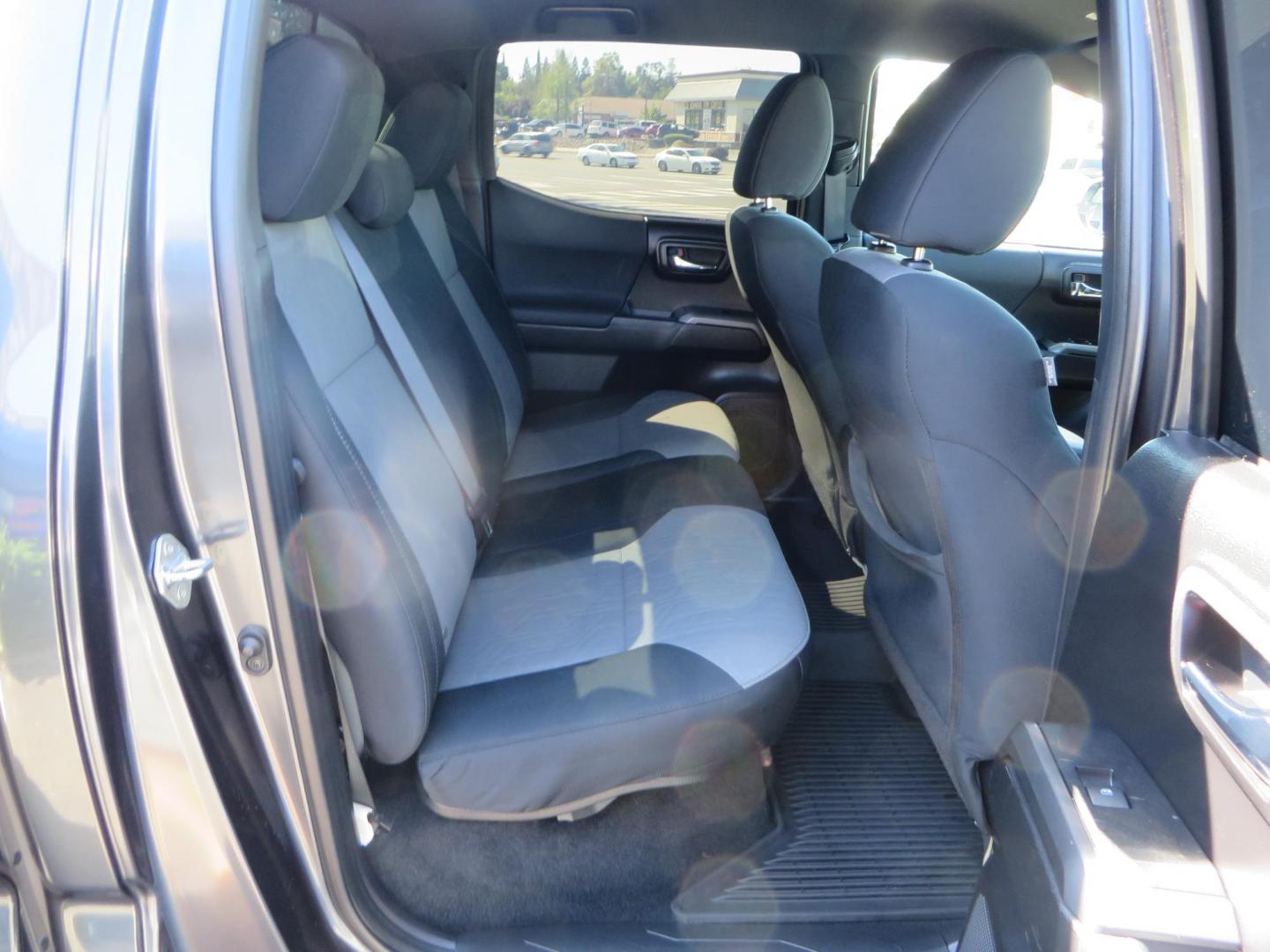 2020 Charcoal /GREY Toyota Tacoma SR5 Double Cab Long Bed V6 6AT 4WD (3TMDZ5BN2LM) with an 3.5L V6 DOHC 24V engine, 6A transmission, located at 2630 Grass Valley Highway, Auburn, CA, 95603, (530) 508-5100, 38.937893, -121.095482 - Tacoma featuring Bilstein 5100 series struts and rear shocks, Icon read add a packs, Method Wheels, Falken Wildpeak AT tires, N-fab runnign boards, Bakflip MX4 bedcover, Molle bed panels, Led Fog lights, and Baja Designs A pillar lights. - Photo#52