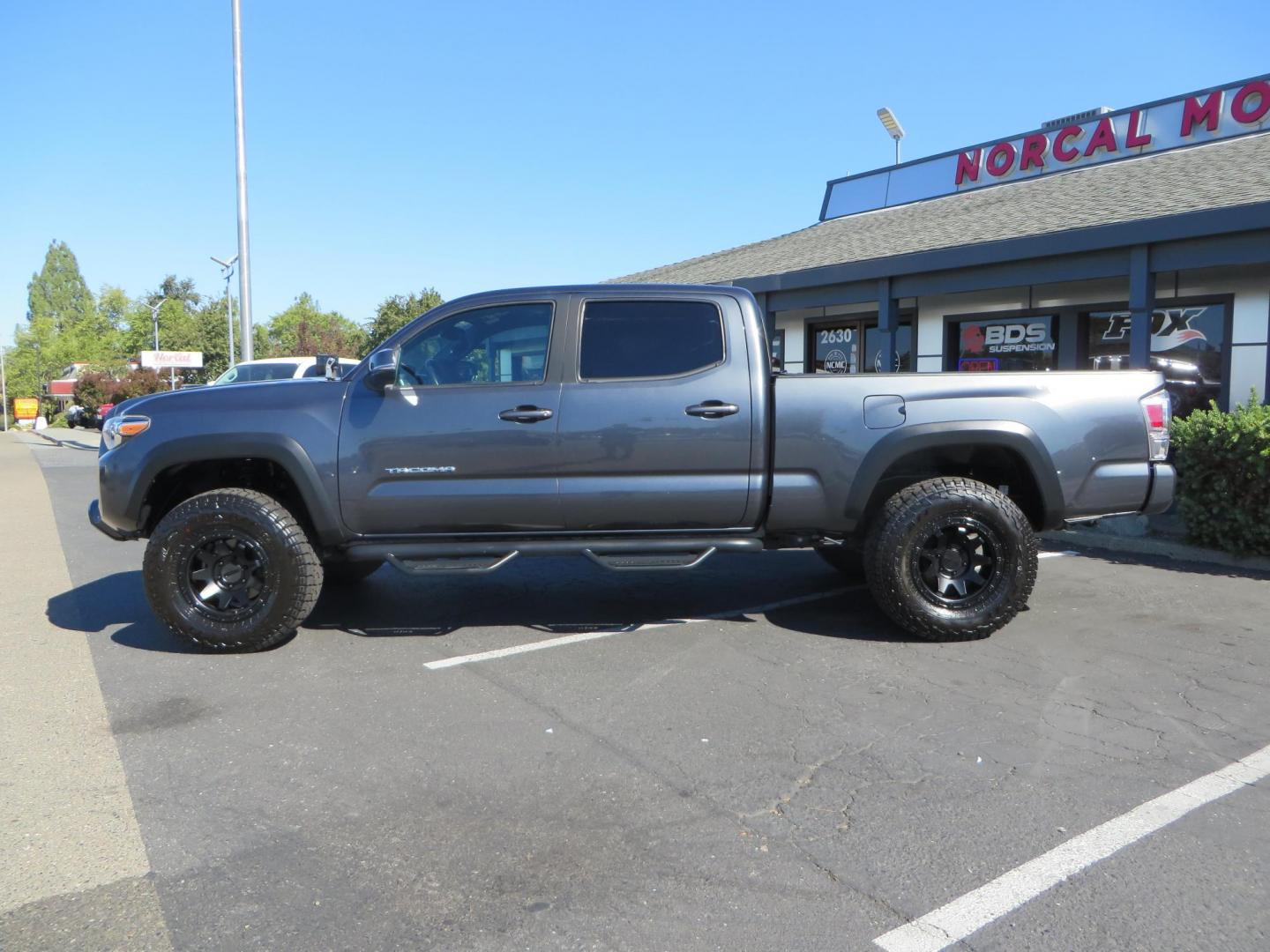 2020 Charcoal /GREY Toyota Tacoma SR5 Double Cab Long Bed V6 6AT 4WD (3TMDZ5BN2LM) with an 3.5L V6 DOHC 24V engine, 6A transmission, located at 2630 Grass Valley Highway, Auburn, CA, 95603, (530) 508-5100, 38.937893, -121.095482 - Tacoma featuring Bilstein 5100 series struts and rear shocks, Icon read add a packs, Method Wheels, Falken Wildpeak AT tires, N-fab runnign boards, Bakflip MX4 bedcover, Molle bed panels, Led Fog lights, and Baja Designs A pillar lights. - Photo#7