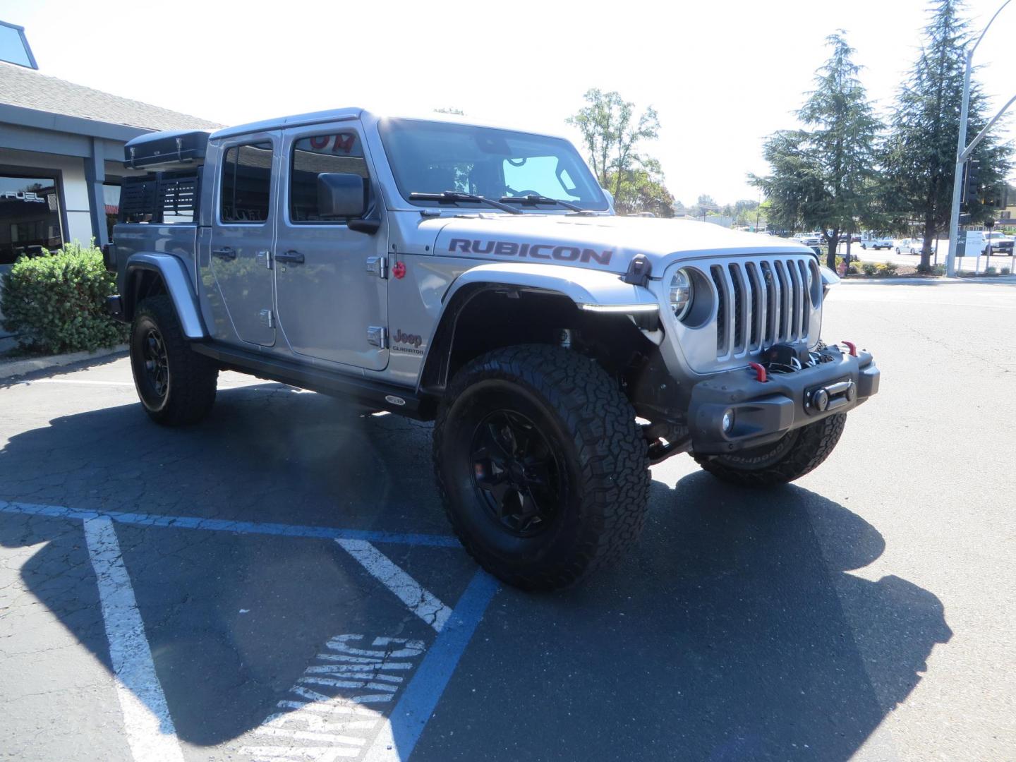 2020 SILVER /BLACK Jeep Gladiator Rubicon (1C6JJTBG1LL) with an 3.6L V6 DOHC 24V engine, 6M transmission, located at 2630 Grass Valley Highway, Auburn, CA, 95603, (530) 508-5100, 38.937893, -121.095482 - Must see Gladiator ready for all of your overlanding adventures. Mopar lift kit with Fox shocks, 37" BFG KO2 tires, Rebel offroad Inner Fender liners, Rebel offroad overland fender chop w/ side markers and turn signals, Smittybilt synthetic rope winch, Yankum fairlead, Rugged Ridge Elite antenna bas - Photo#2