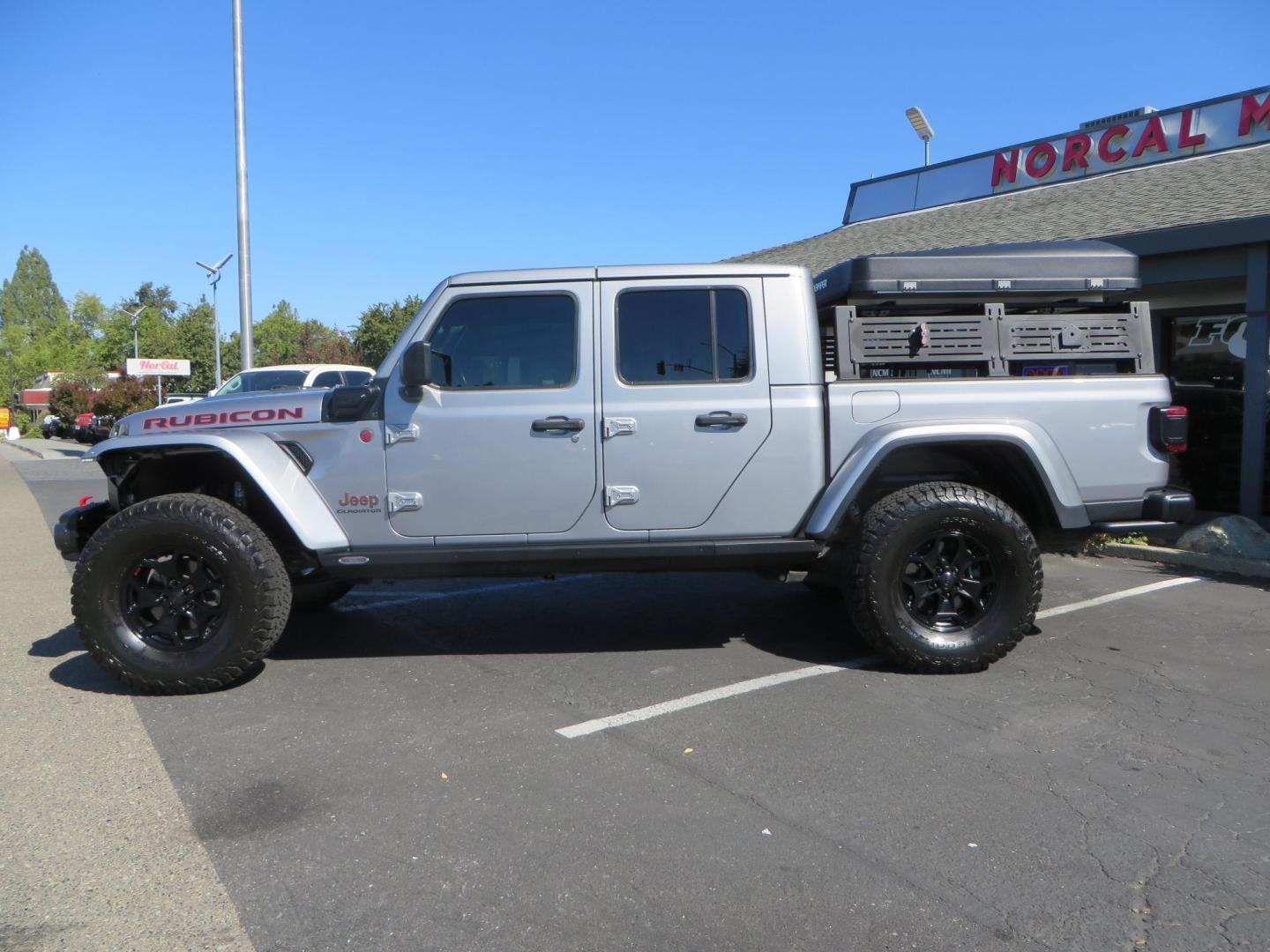 2020 SILVER /BLACK Jeep Gladiator Rubicon (1C6JJTBG1LL) with an 3.6L V6 DOHC 24V engine, 6M transmission, located at 2630 Grass Valley Highway, Auburn, CA, 95603, (530) 508-5100, 38.937893, -121.095482 - Must see Gladiator ready for all of your overlanding adventures. Mopar lift kit with Fox shocks, 37" BFG KO2 tires, Rebel offroad Inner Fender liners, Rebel offroad overland fender chop w/ side markers and turn signals, Smittybilt synthetic rope winch, Yankum fairlead, Rugged Ridge Elite antenna bas - Photo#7