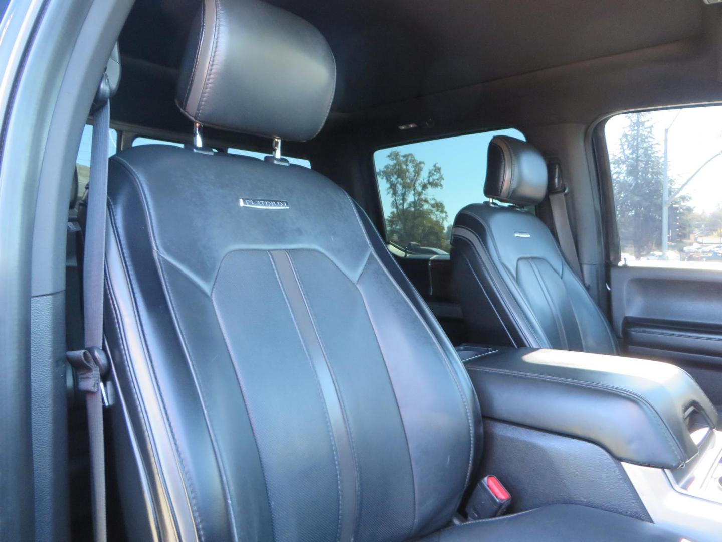 2017 BLACK Ford F-250 SD Platinum Crew Cab Short Bed 4WD (1FT7W2BT0HE) with an 6.7L V8 OHV 16V DIESEL engine, 6A transmission, located at 2630 Grass Valley Highway, Auburn, CA, 95603, (530) 508-5100, 38.937893, -121.095482 - Lifted F-250 featuring a SkyJacker long arm suspension system, Fox 2.5 remote reservoir coilovers, Fox 2.0 rear remote reservoir shocks, Fox dual steering stabilizers, 20" XD wheels, 37" Nitto Ridge Grappler tires, Racer X Mesh Grille, Airlift Air Bags, Painted badges, and window tint. - Photo#63