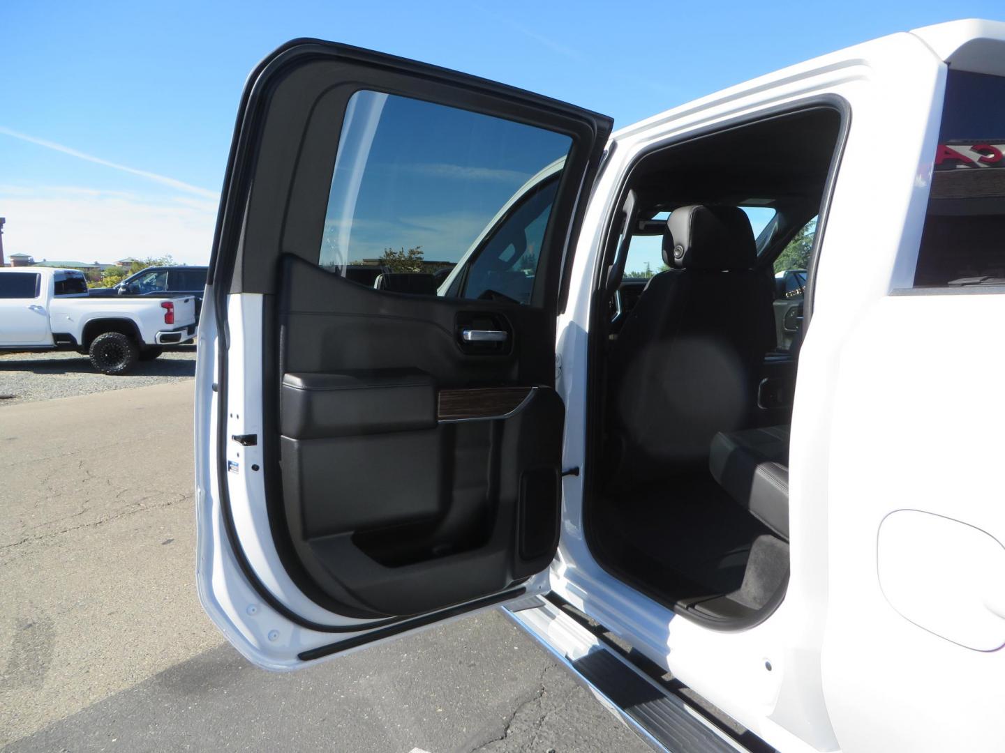 2021 White Chevrolet Silverado 1500 High Country Crew Cab 4WD (3GCUYHEL2MG) with an 6.2L V8 OHV 16V engine, 6A transmission, located at 2630 Grass Valley Highway, Auburn, CA, 95603, (530) 508-5100, 38.937893, -121.095482 - Features - Zone Offroad 6" lift kit, 35" Nitto Ridge Grappler tires, 20" SOTA wheels, and a Bakflip MX4 bedcover. - Photo#45