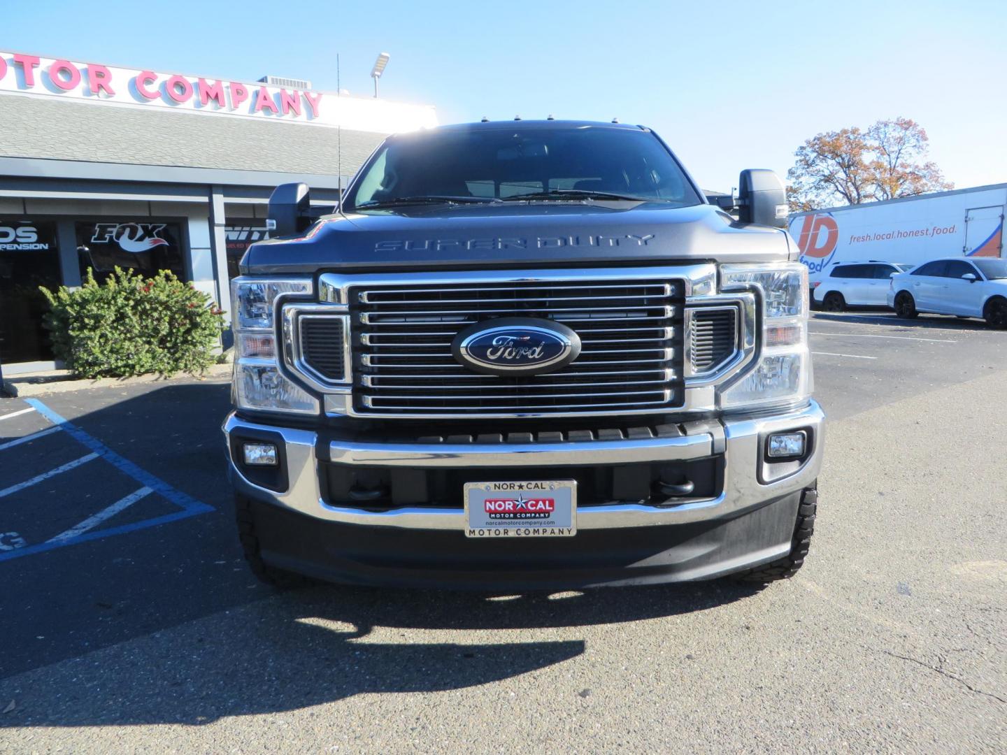 2021 Charcoal Ford F-350 SD Lariat Crew Cab Long Bed DRW 4WD (1FT8W3DT7ME) with an 6.7L V8 OHV 16V DIESEL engine, 6A transmission, located at 2630 Grass Valley Highway, Auburn, CA, 95603, (530) 508-5100, 38.937893, -121.095482 - Tow Rig sitting on a set of 20" DDC The Hole wheels and Toyo RT trail tires. - Photo#1