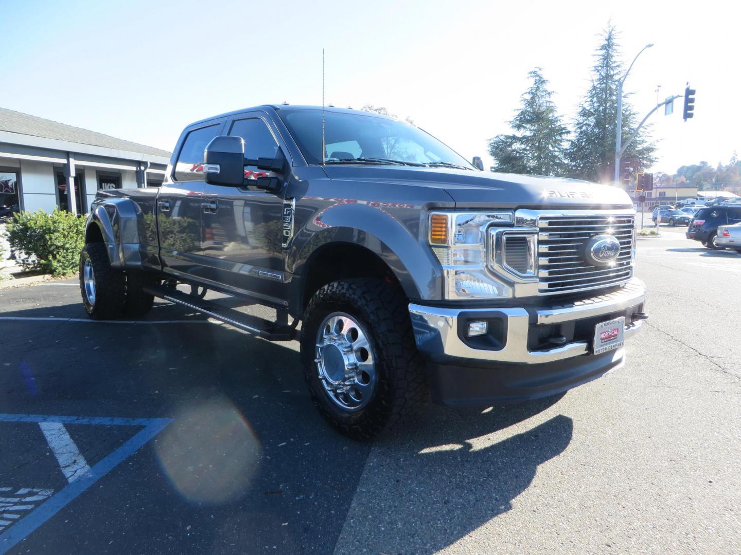 2021 Charcoal Ford F-350 SD Lariat Crew Cab Long Bed DRW 4WD (1FT8W3DT7ME) with an 6.7L V8 OHV 16V DIESEL engine, 6A transmission, located at 2630 Grass Valley Highway, Auburn, CA, 95603, (530) 508-5100, 38.937893, -121.095482 - Tow Rig sitting on a set of 20" DDC The Hole wheels and Toyo RT trail tires. - Photo#2