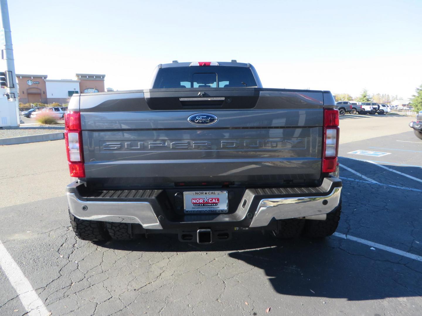 2021 Charcoal Ford F-350 SD Lariat Crew Cab Long Bed DRW 4WD (1FT8W3DT7ME) with an 6.7L V8 OHV 16V DIESEL engine, 6A transmission, located at 2630 Grass Valley Highway, Auburn, CA, 95603, (530) 508-5100, 38.937893, -121.095482 - Tow Rig sitting on a set of 20" DDC The Hole wheels and Toyo RT trail tires. - Photo#5