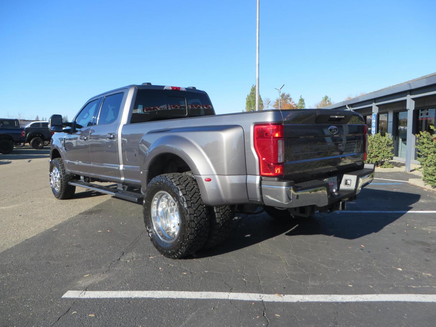 2021 Charcoal Ford F-350 SD Lariat Crew Cab Long Bed DRW 4WD (1FT8W3DT7ME) with an 6.7L V8 OHV 16V DIESEL engine, 6A transmission, located at 2630 Grass Valley Highway, Auburn, CA, 95603, (530) 508-5100, 38.937893, -121.095482 - Tow Rig sitting on a set of 20" DDC The Hole wheels and Toyo RT trail tires. - Photo#6