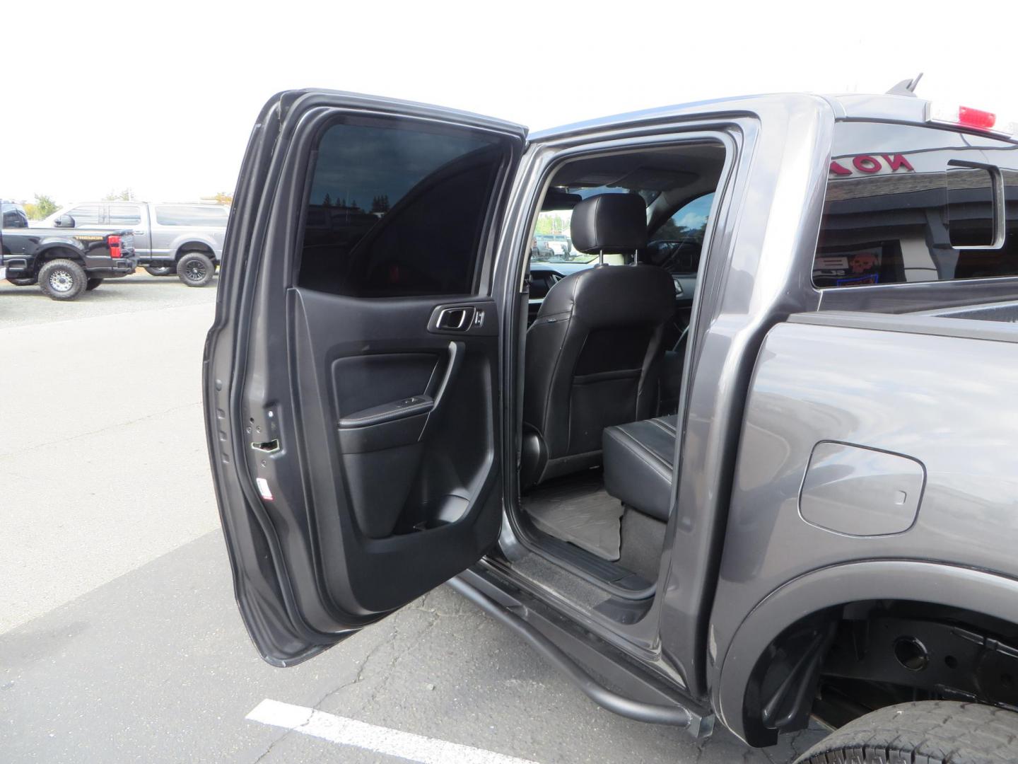 2019 Charcoal Ford Ranger Lariat SuperCrew 4WD (1FTER4FH8KL) with an 2.3L L4 DOHC 16V engine, 10A transmission, located at 2630 Grass Valley Highway, Auburn, CA, 95603, (530) 508-5100, 38.937893, -121.095482 - Features, King 2.5 remote reservoir coilovers, King 2.5 piggyback shocks, Camburg upper control arms, Method Race wheels, Lexani Terrain Beast tires, Baja Designs fog lights, Rock Sliders, Windiw tint, and an ARB air compressor. - Photo#39