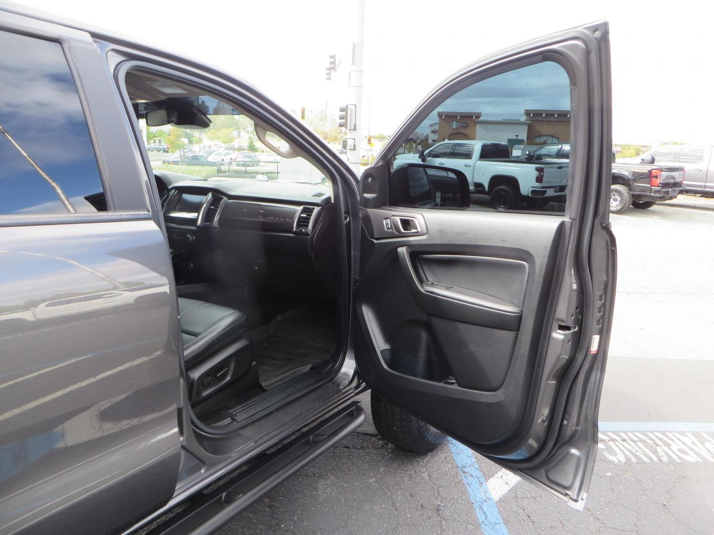 2019 Charcoal Ford Ranger Lariat SuperCrew 4WD (1FTER4FH8KL) with an 2.3L L4 DOHC 16V engine, 10A transmission, located at 2630 Grass Valley Highway, Auburn, CA, 95603, (530) 508-5100, 38.937893, -121.095482 - Features, King 2.5 remote reservoir coilovers, King 2.5 piggyback shocks, Camburg upper control arms, Method Race wheels, Lexani Terrain Beast tires, Baja Designs fog lights, Rock Sliders, Windiw tint, and an ARB air compressor. - Photo#49