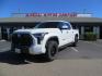 2022 White Toyota Tundra Limited CrewMax 2WD (5TFJA5AB0NX) with an 3.5L V6 DOHC 24V engine, 6A transmission, located at 2630 Grass Valley Highway, Auburn, CA, 95603, (530) 508-5100, 38.937893, -121.095482 - Tundra featuring a 2" leveling kit, 35" Nitto Ridge Grappler tires, 18" KMC IMS wheels, Retrax tonneau cover, and Yakima truck bed ladder rack. - Photo#0