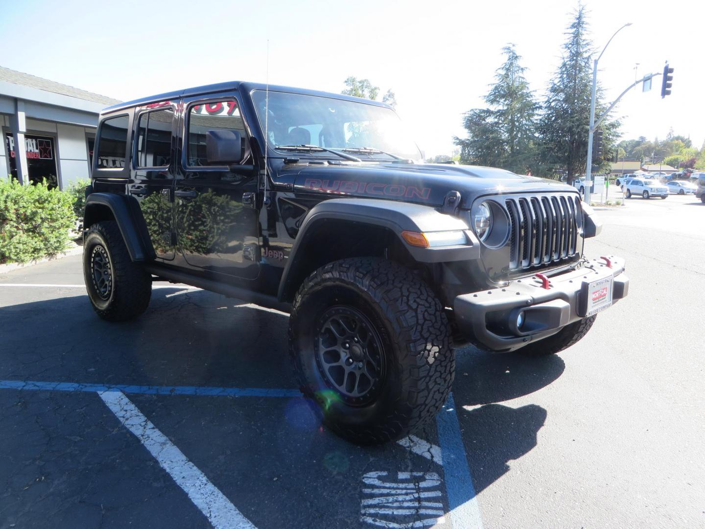 2020 BLACK /BLACK Jeep Wrangler Unlimited Rubicon (1C4HJXFGXLW) with an 3.6L V6 DOHC 24V FFV engine, 6A transmission, located at 2630 Grass Valley Highway, Auburn, CA, 95603, (530) 508-5100, 38.937893, -121.095482 - Rubicon with a set of brand new 392 wheels and tires as well as a new factory soft top never installed. - Photo#1