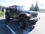 2020 BLACK /BLACK Jeep Wrangler Unlimited Rubicon (1C4HJXFGXLW) with an 3.6L V6 DOHC 24V FFV engine, 6A transmission, located at 2630 Grass Valley Highway, Auburn, CA, 95603, (530) 508-5100, 38.937893, -121.095482 - Rubicon with a set of brand new 392 wheels and tires as well as a new factory soft top never installed. - Photo#1