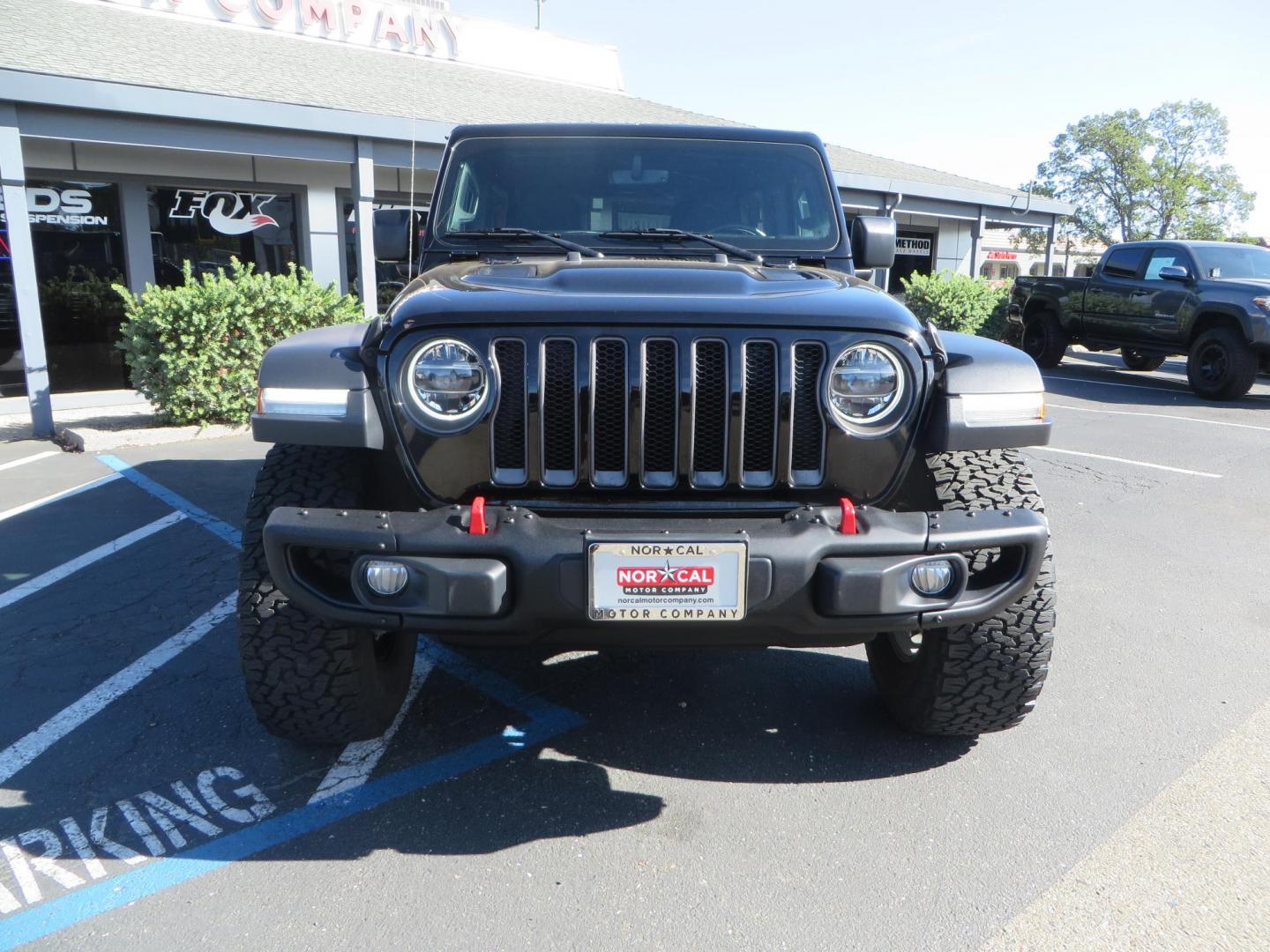 2020 BLACK /BLACK Jeep Wrangler Unlimited Rubicon (1C4HJXFGXLW) with an 3.6L V6 DOHC 24V FFV engine, 6A transmission, located at 2630 Grass Valley Highway, Auburn, CA, 95603, (530) 508-5100, 38.937893, -121.095482 - Rubicon with a set of brand new 392 wheels and tires as well as a new factory soft top never installed. - Photo#2