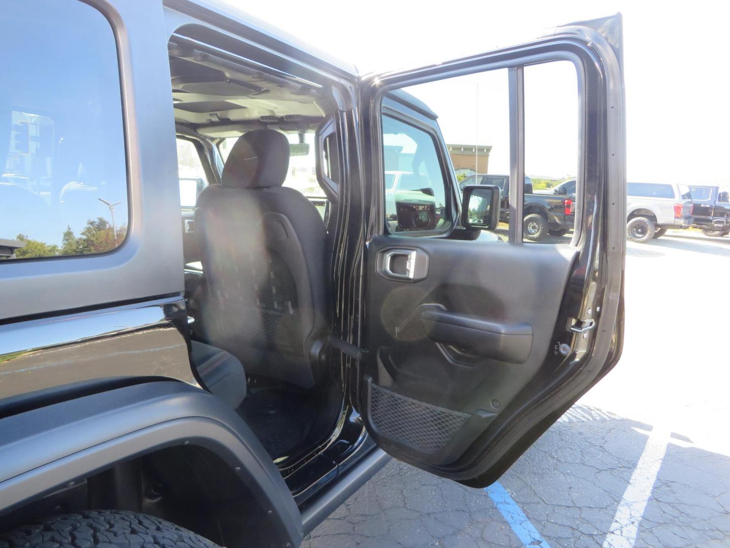 2020 BLACK /BLACK Jeep Wrangler Unlimited Rubicon (1C4HJXFGXLW) with an 3.6L V6 DOHC 24V FFV engine, 6A transmission, located at 2630 Grass Valley Highway, Auburn, CA, 95603, (530) 508-5100, 38.937893, -121.095482 - Rubicon with a set of brand new 392 wheels and tires as well as a new factory soft top never installed. - Photo#54