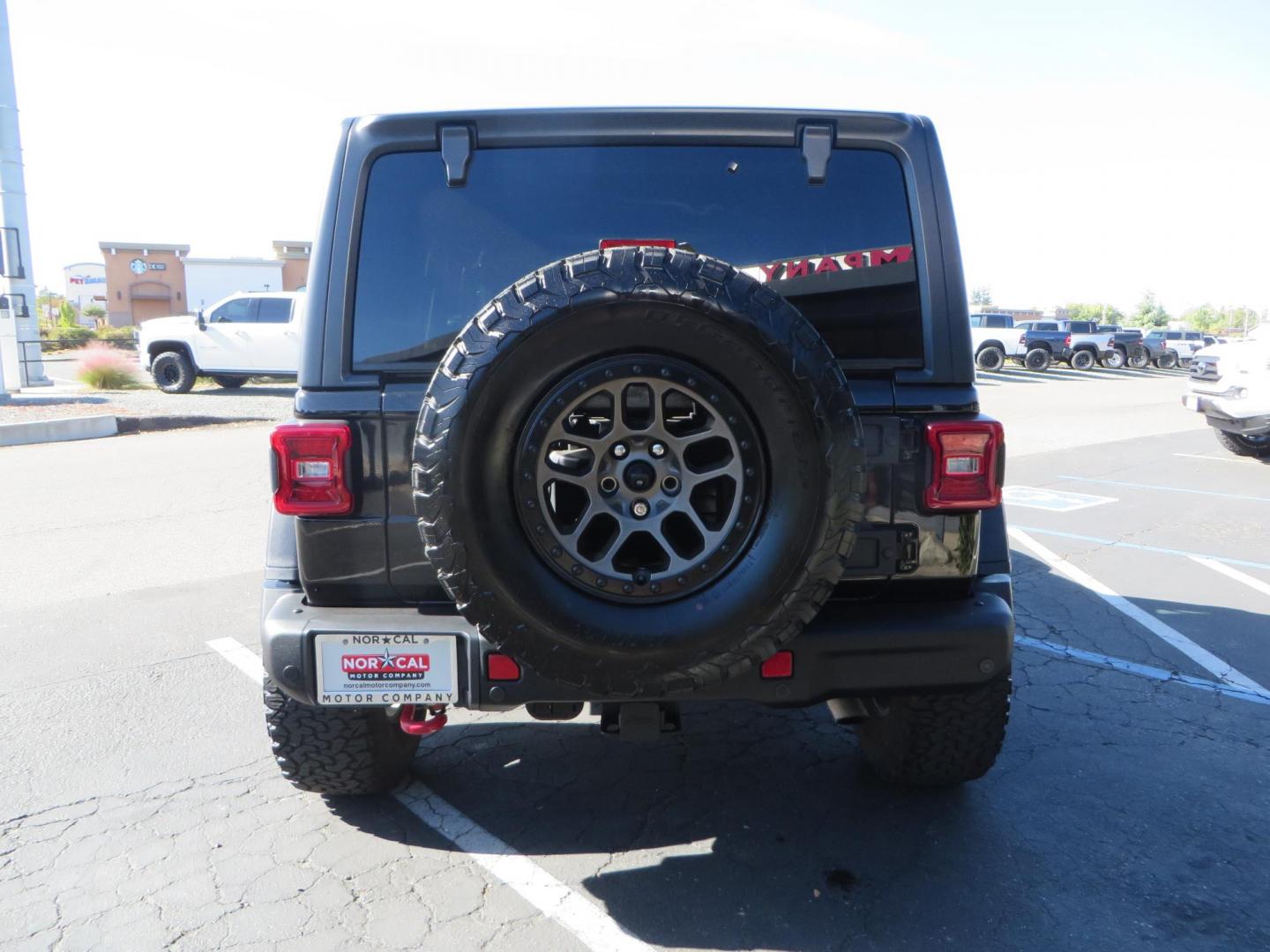 2020 BLACK /BLACK Jeep Wrangler Unlimited Rubicon (1C4HJXFGXLW) with an 3.6L V6 DOHC 24V FFV engine, 6A transmission, located at 2630 Grass Valley Highway, Auburn, CA, 95603, (530) 508-5100, 38.937893, -121.095482 - Rubicon with a set of brand new 392 wheels and tires as well as a new factory soft top never installed. - Photo#6