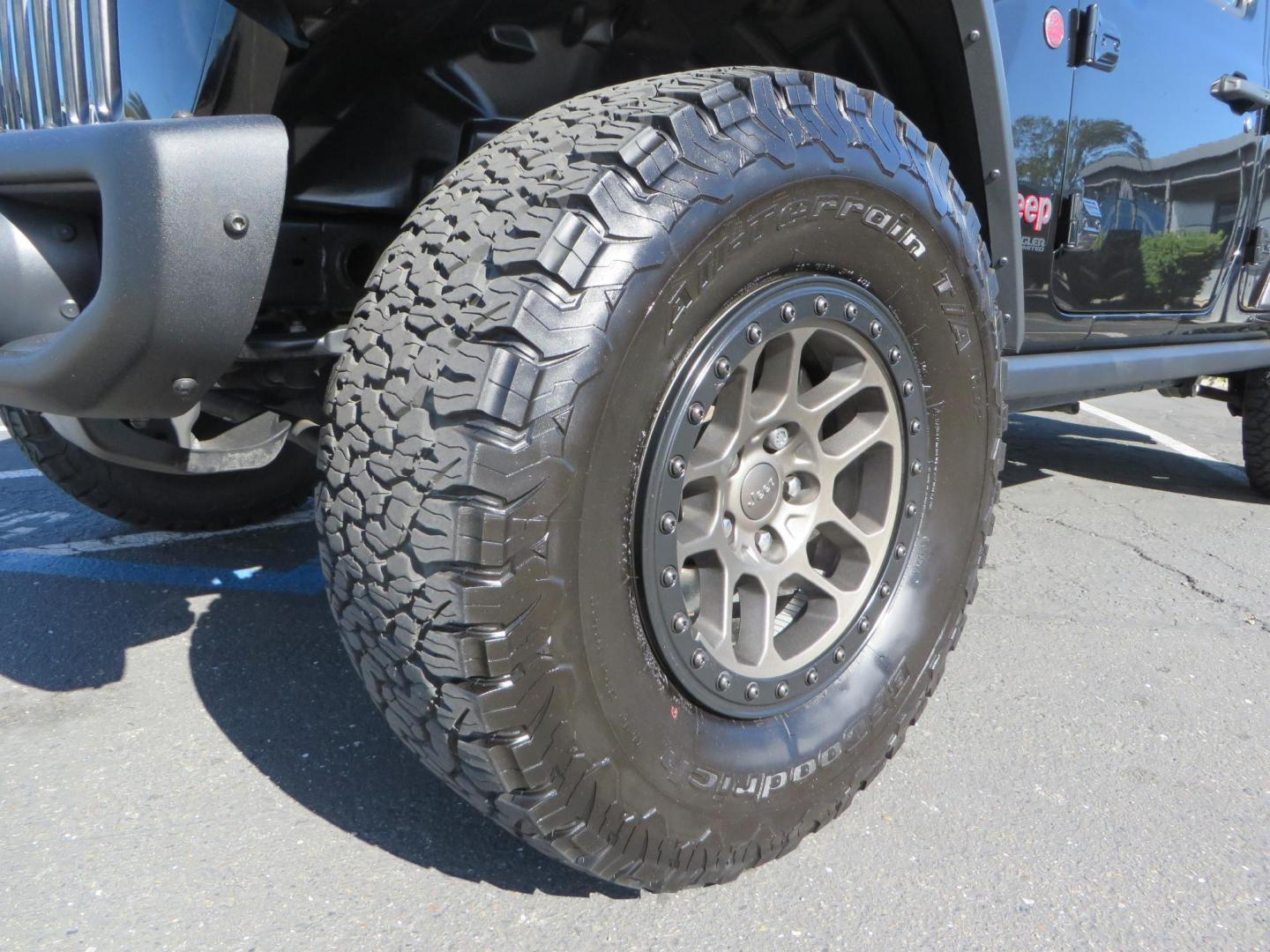 2020 BLACK /BLACK Jeep Wrangler Unlimited Rubicon (1C4HJXFGXLW) with an 3.6L V6 DOHC 24V FFV engine, 6A transmission, located at 2630 Grass Valley Highway, Auburn, CA, 95603, (530) 508-5100, 38.937893, -121.095482 - Rubicon with a set of brand new 392 wheels and tires as well as a new factory soft top never installed. - Photo#9